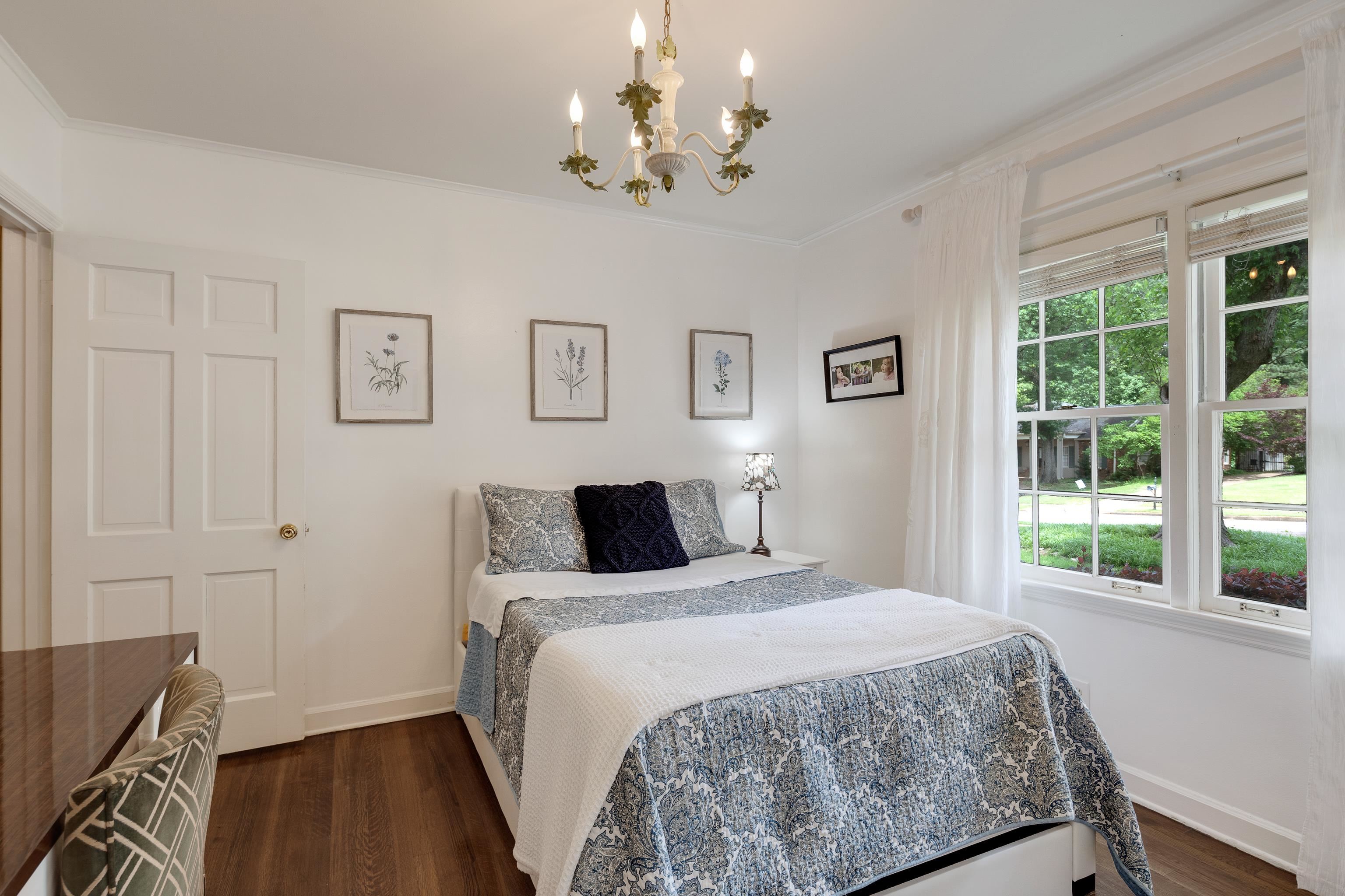 5371 South Angela Road Memphis, TN 38120 - Photo 18 of 25 a bedroom with a bed and a window