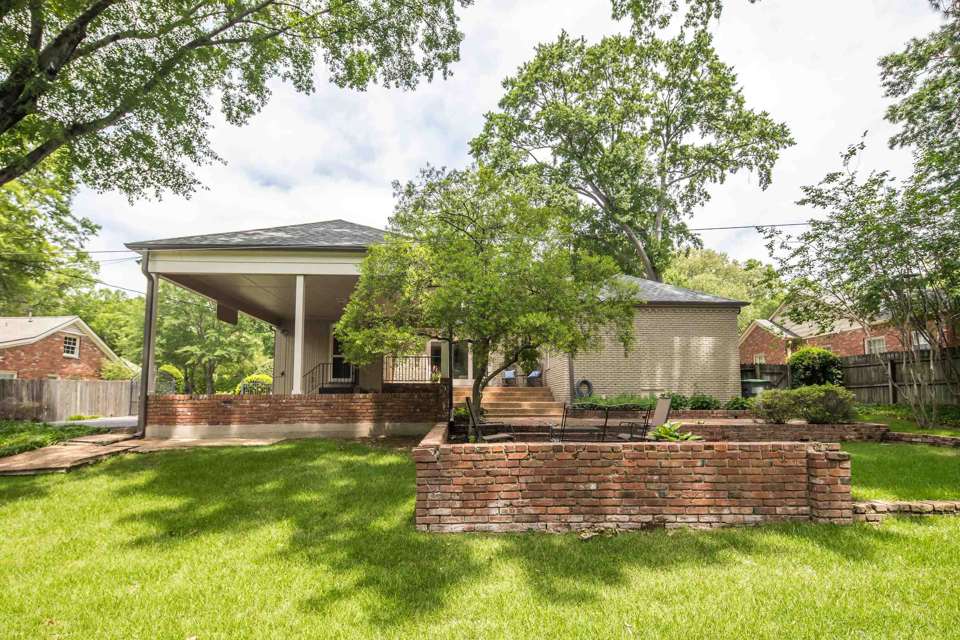 5371 South Angela Road Memphis, TN 38120 - Photo 25 of 25 a front view of a house with a yard