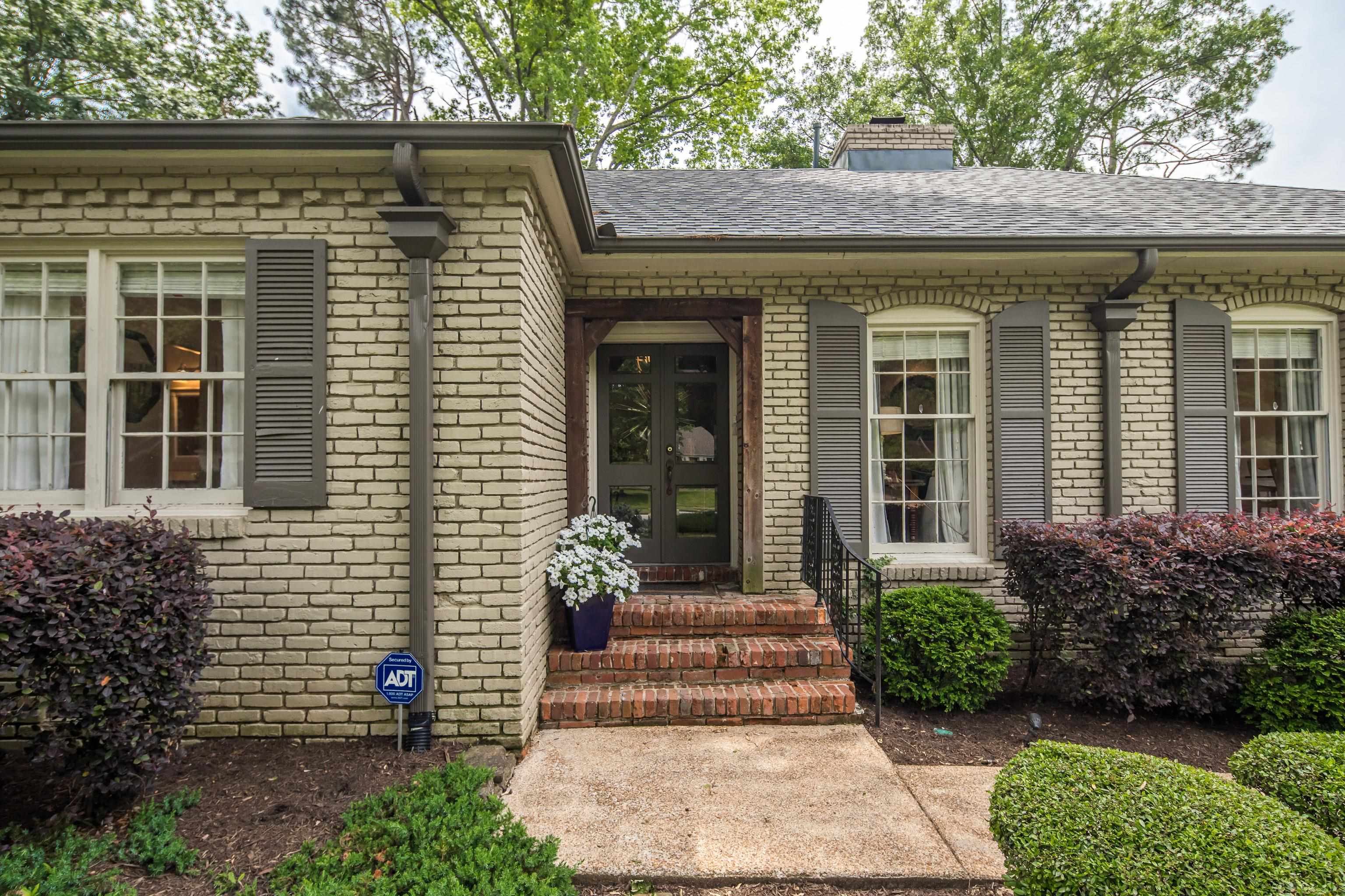 5371 South Angela Road Memphis, TN 38120 - Photo 3 of 25 a view of a house with potted plants