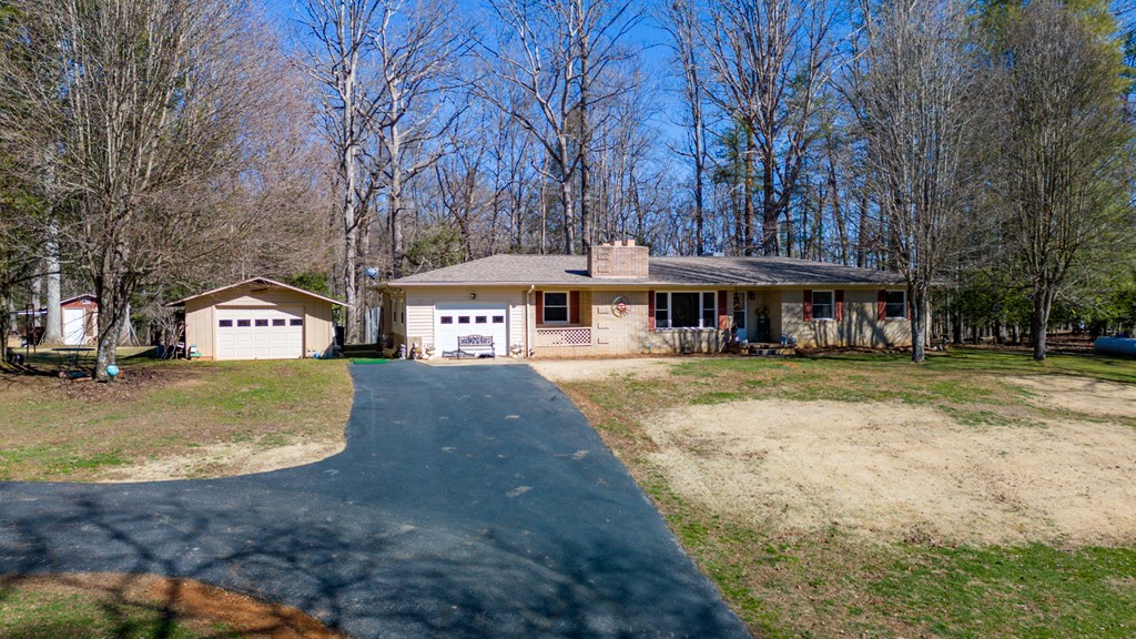 1550 Highway 2 Blue Ridge, GA 30513 - Photo 39 of 46 a front view of a building with a yard