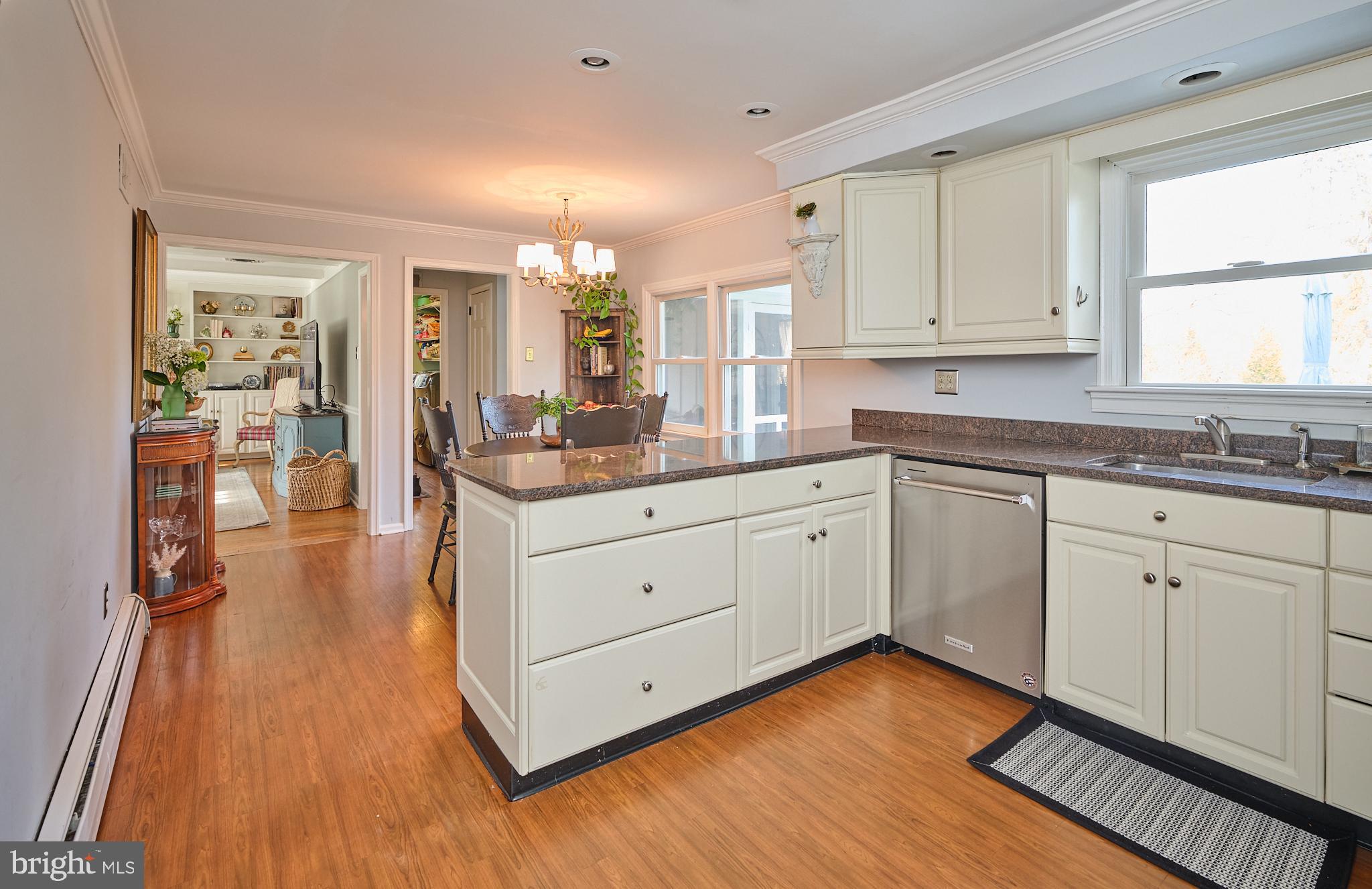 3889 Robin Road Furlong, PA 18925 - Photo 12 of 48 a kitchen with a sink window and cabinets