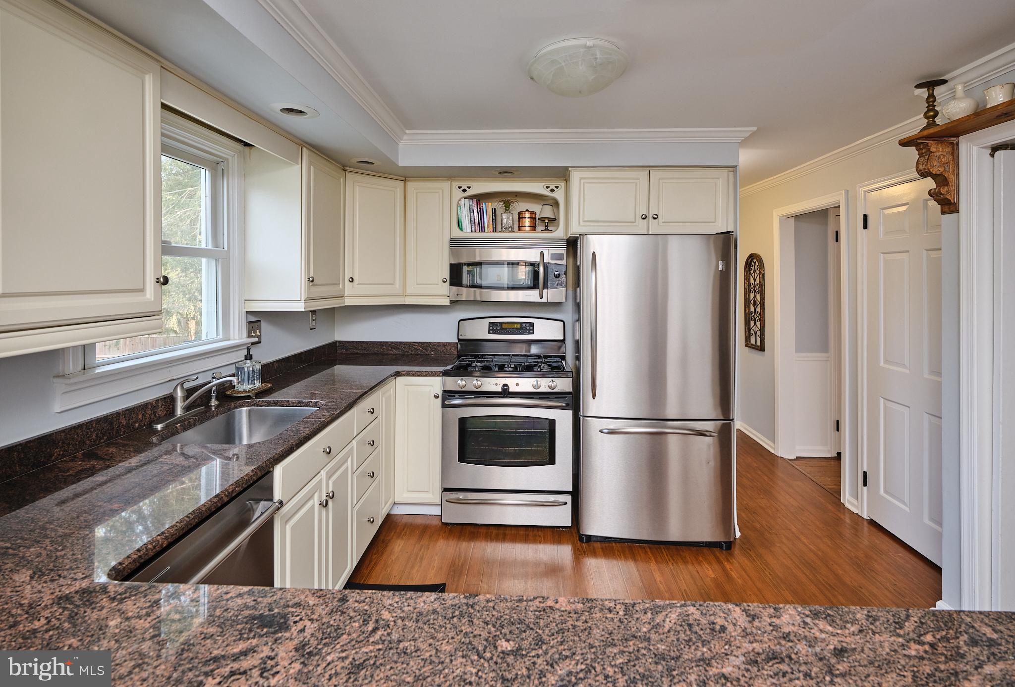 3889 Robin Road Furlong, PA 18925 - Photo 14 of 48 a kitchen with a refrigerator stove and sink