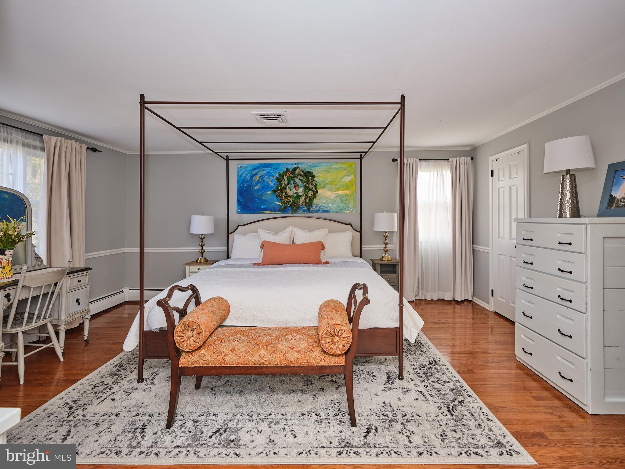 3889 Robin Road Furlong, PA 18925 - Photo 25 of 48 a bedroom with a bed and a dresser