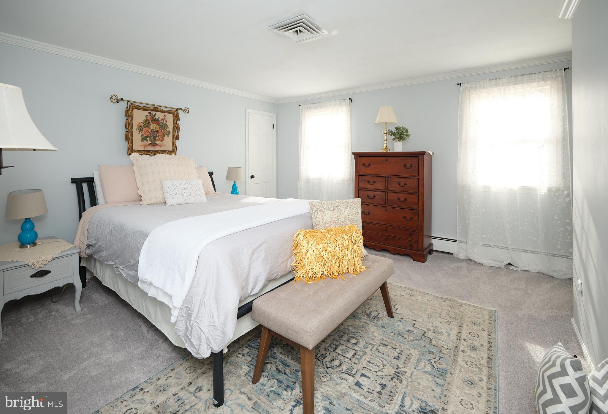 3889 Robin Road Furlong, PA 18925 - Photo 28 of 48 a bedroom with a bed and a dresser in it