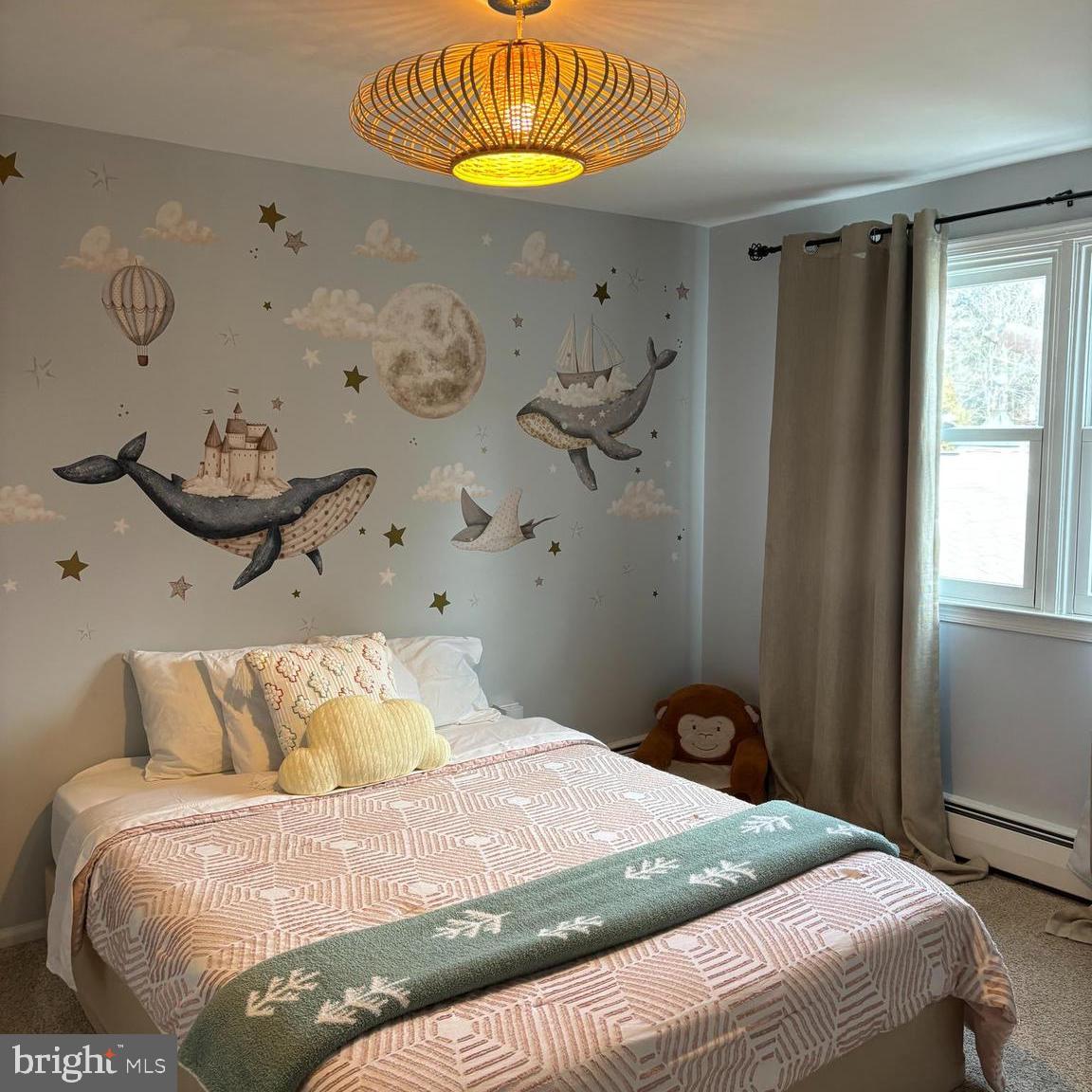 3889 Robin Road Furlong, PA 18925 - Photo 31 of 48 a bedroom with a bed and a chandelier