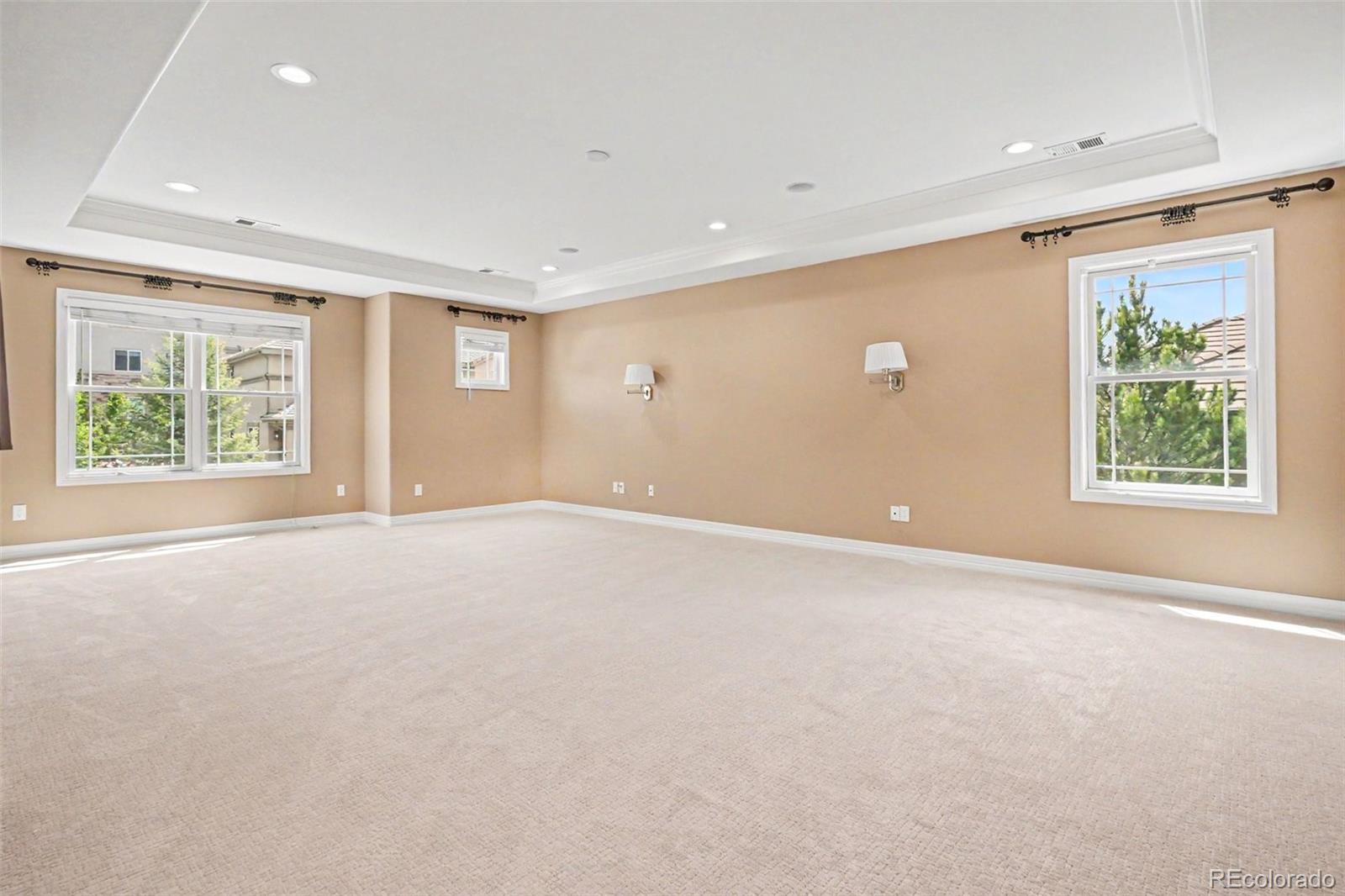 791 Elk Rest Road Evergreen, CO 80439 - Photo 20 of 46 an empty room with windows