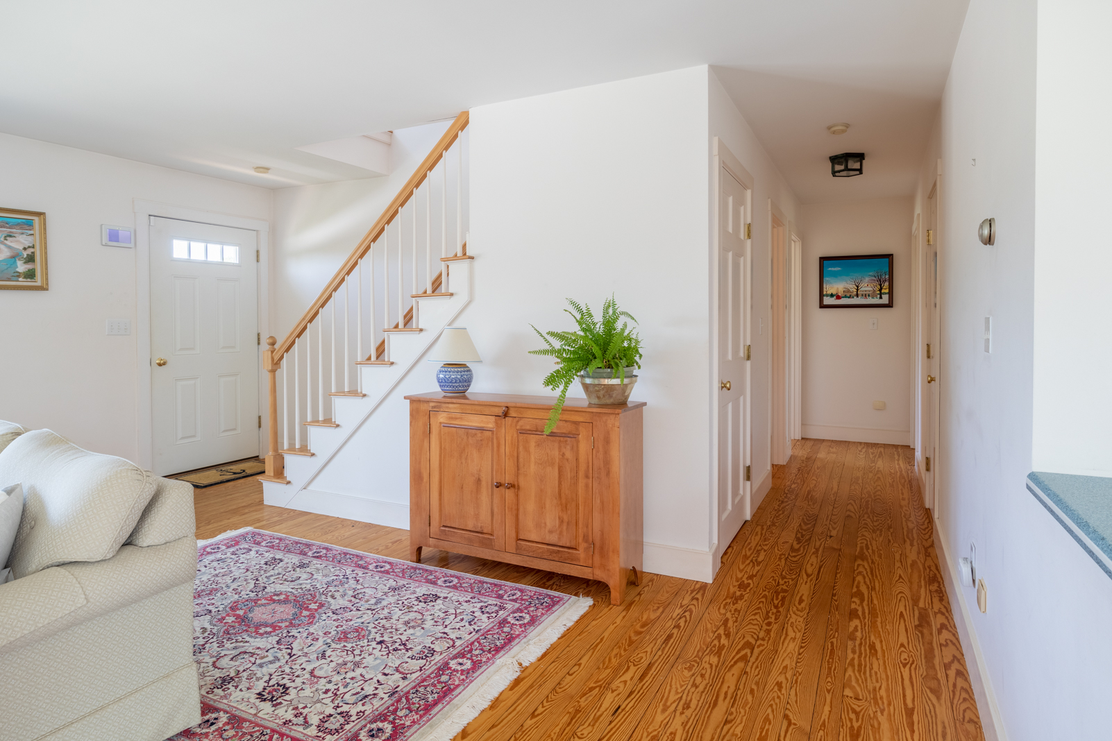 15 Swift Rock Road Nantucket, MA 02554 - Photo 14 of 32 a view of entryway with wooden floor and stairs
