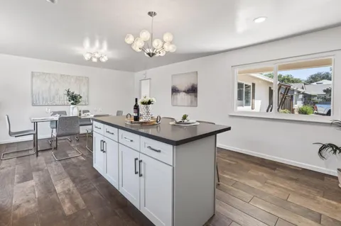 a bathroom with sink and mirror