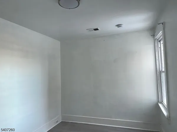 a bathroom with a sink mirror toilet and bathtub