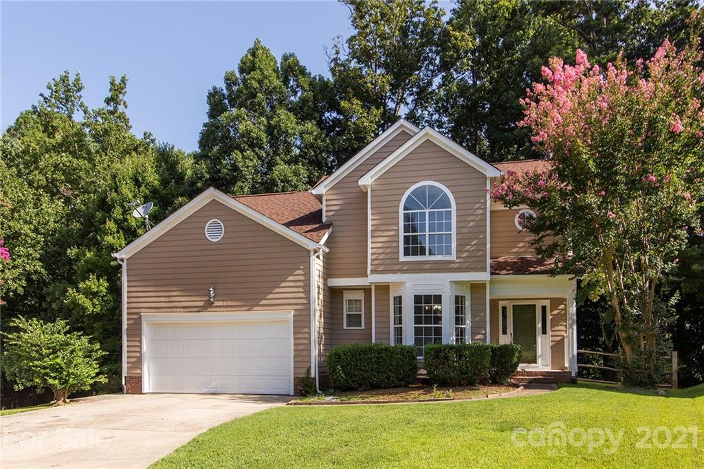 3518 Rindle Court Charlotte, NC 28269 - Photo 1 of 21 a front view of a house with garden