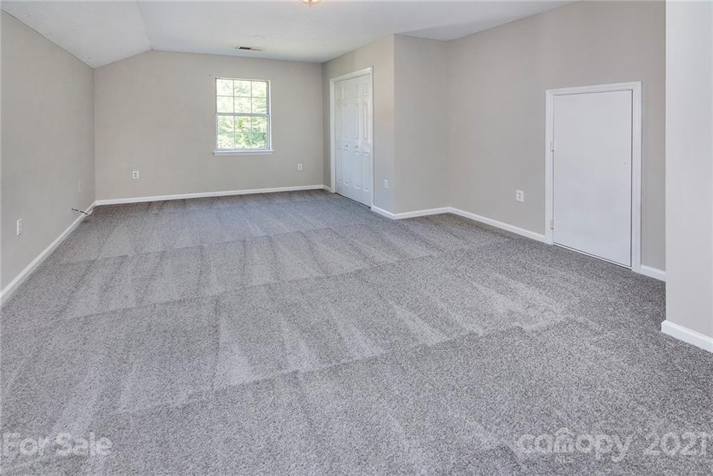3518 Rindle Court Charlotte, NC 28269 - Photo 15 of 21 a view of an empty room with a window