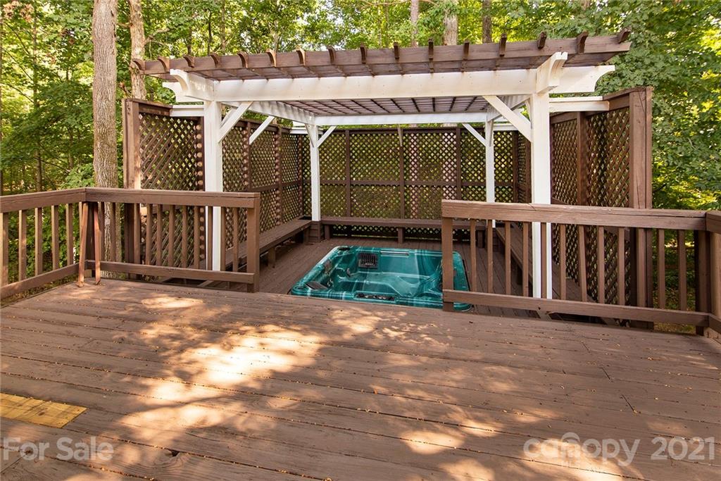 3518 Rindle Court Charlotte, NC 28269 - Photo 19 of 21 a view of a small house with wooden fence
