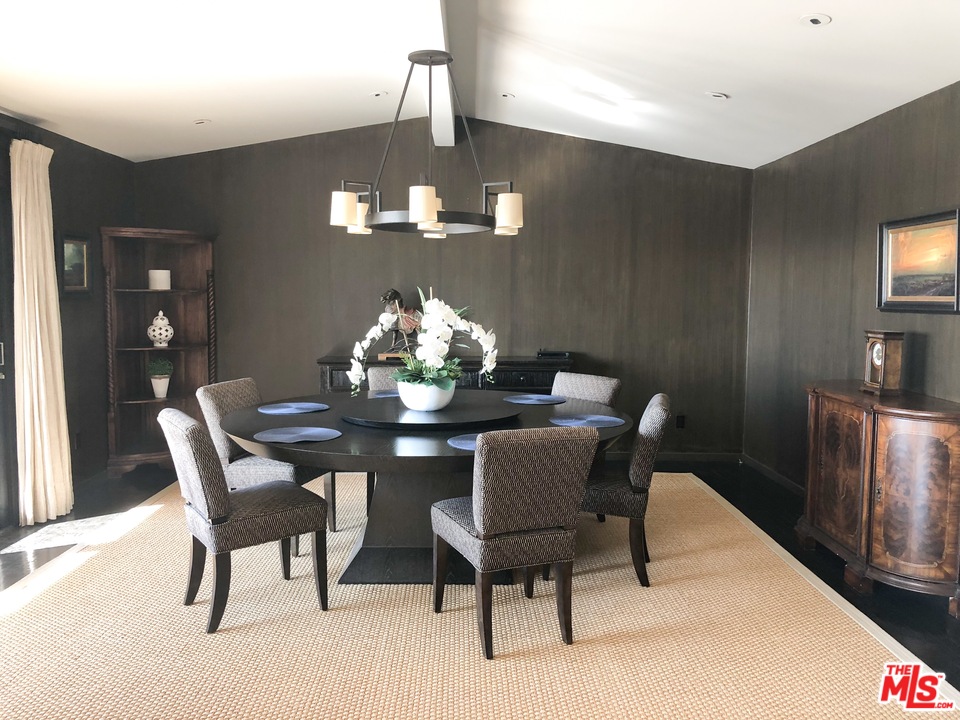 410 Walker Drive Beverly Hills, CA 90210 - Photo 14 of 36 a view of a dining room with furniture