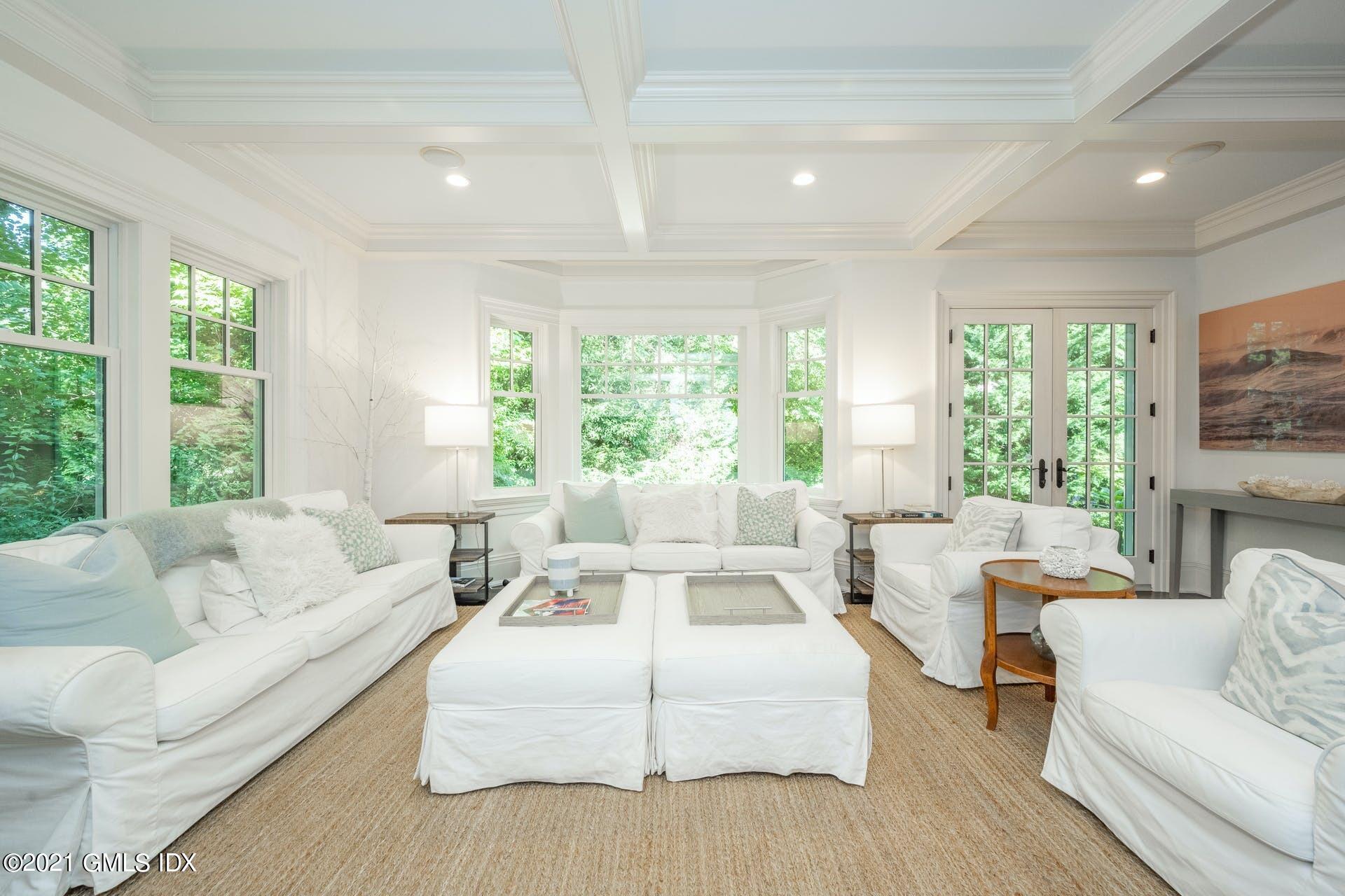 45 Willow Road Riverside, CT 06878 - Photo 16 of 38 a living room with furniture and large windows