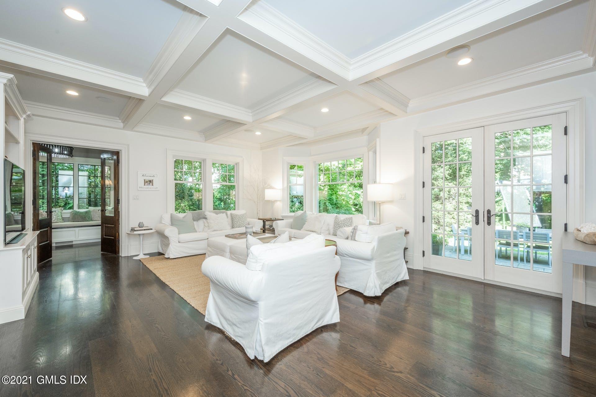 45 Willow Road Riverside, CT 06878 - Photo 17 of 38 a living room with furniture and a large window