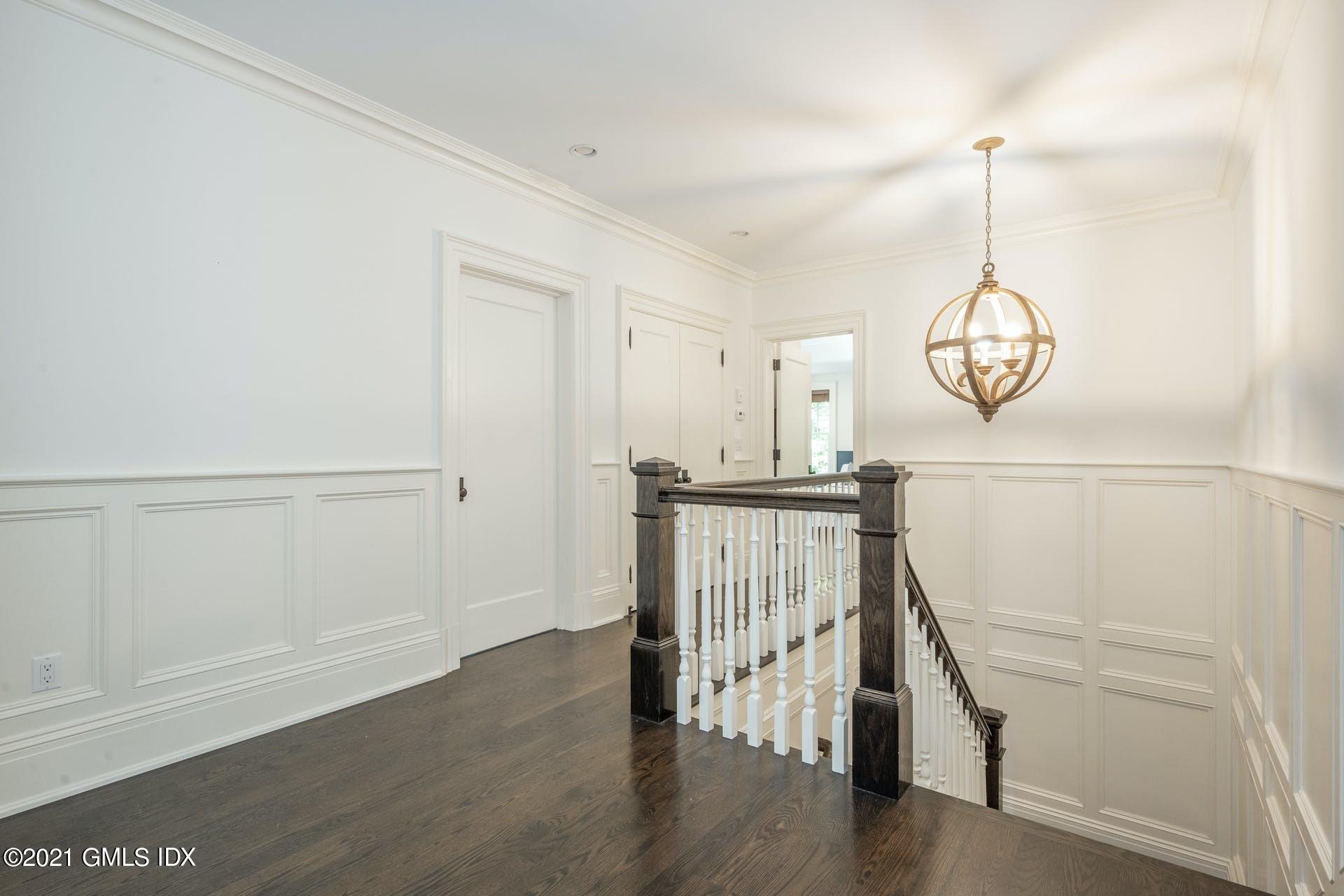 45 Willow Road Riverside, CT 06878 - Photo 18 of 38 a view of entryway with wooden floor
