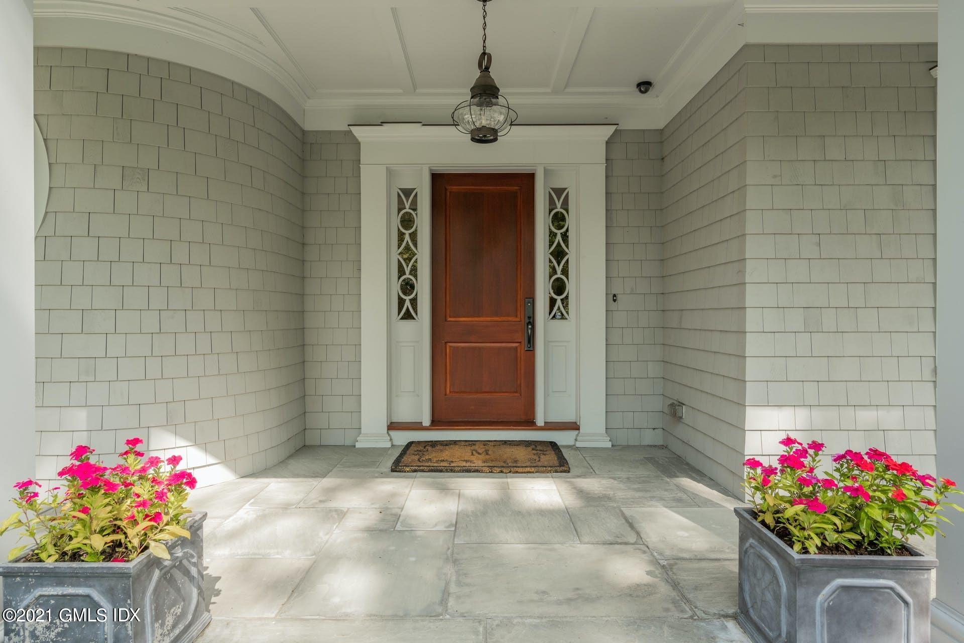 45 Willow Road Riverside, CT 06878 - Photo 2 of 38 a front view of a house