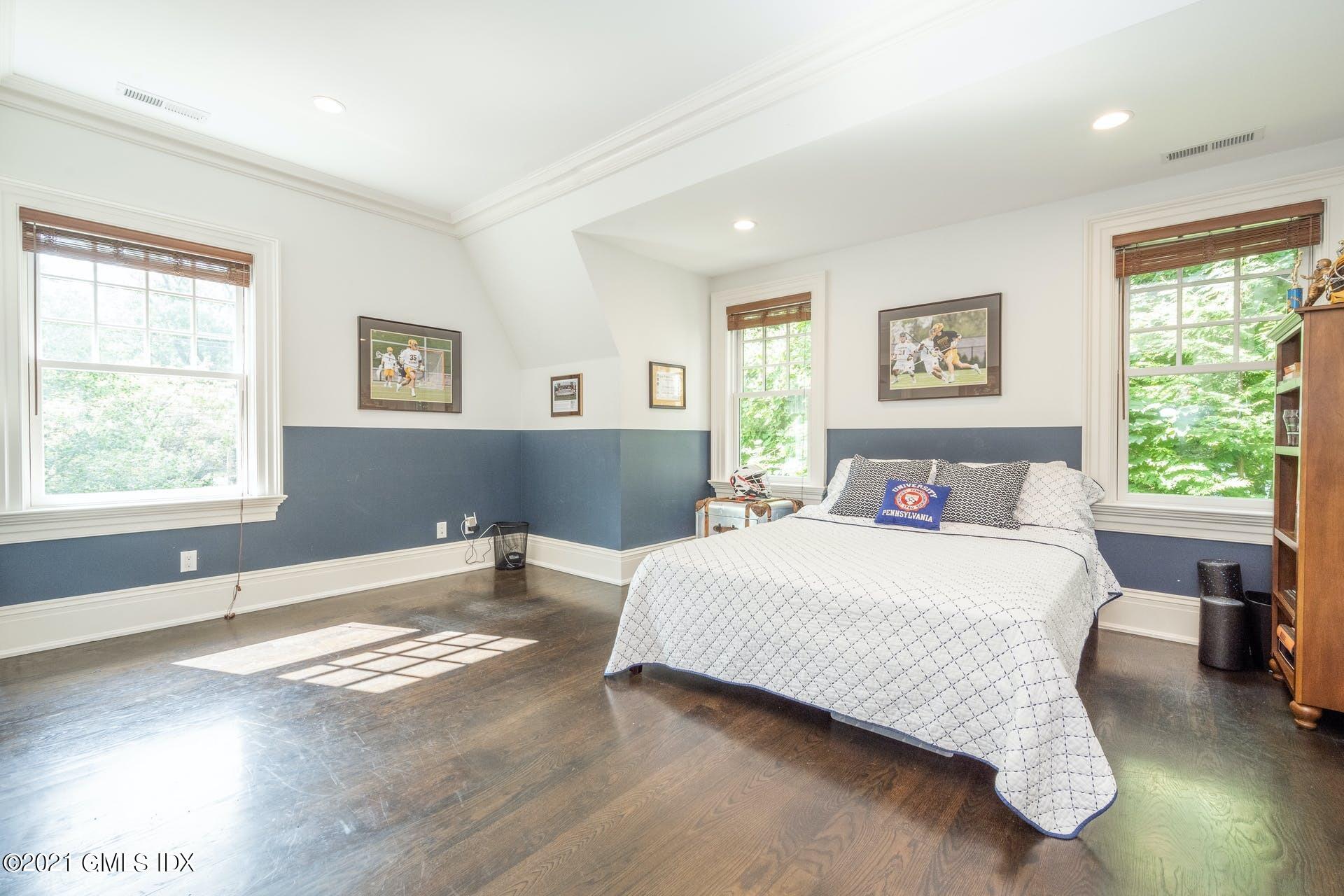 45 Willow Road Riverside, CT 06878 - Photo 26 of 38 a bedroom with a bed and window