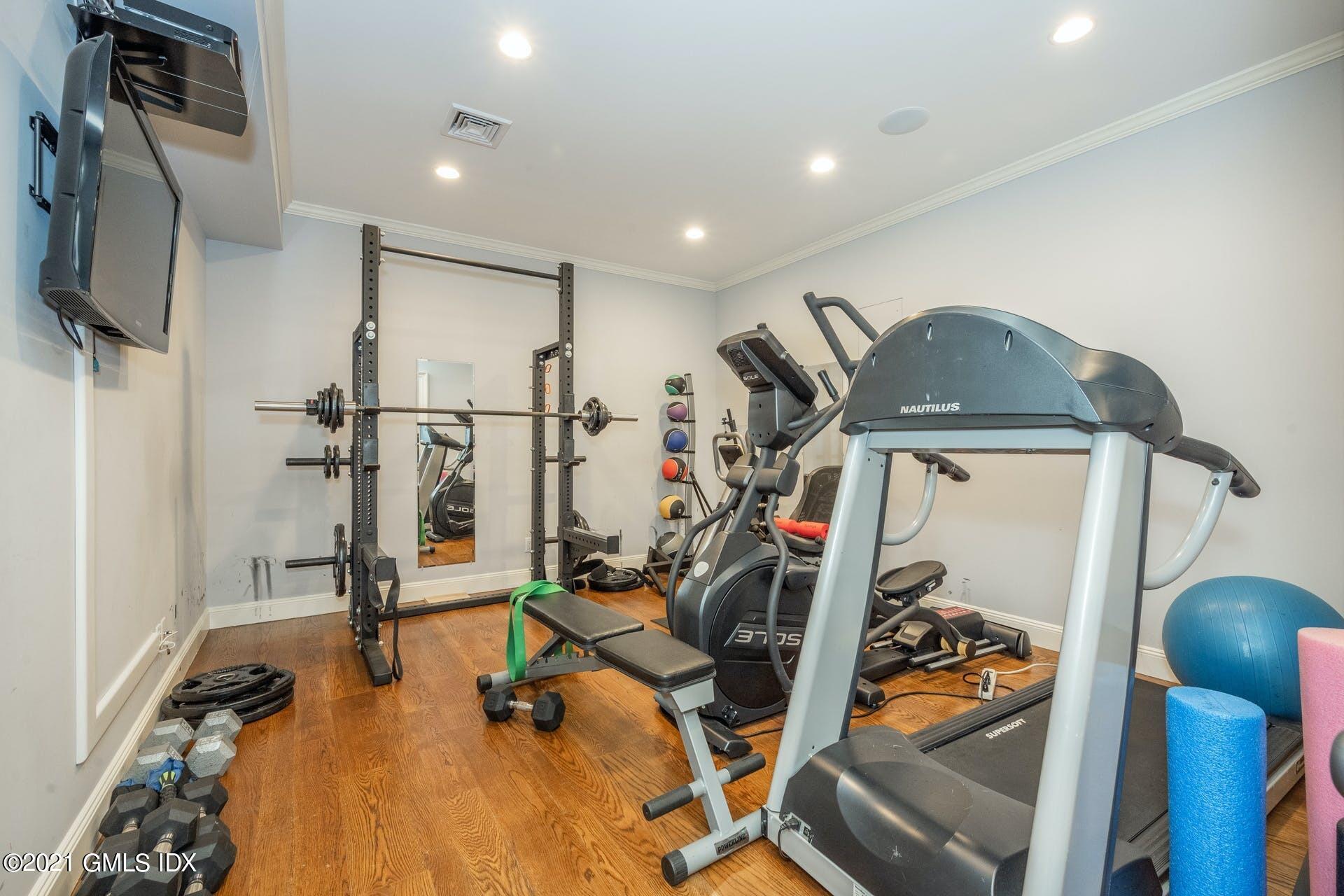 45 Willow Road Riverside, CT 06878 - Photo 32 of 38 a view of a room with gym equipment