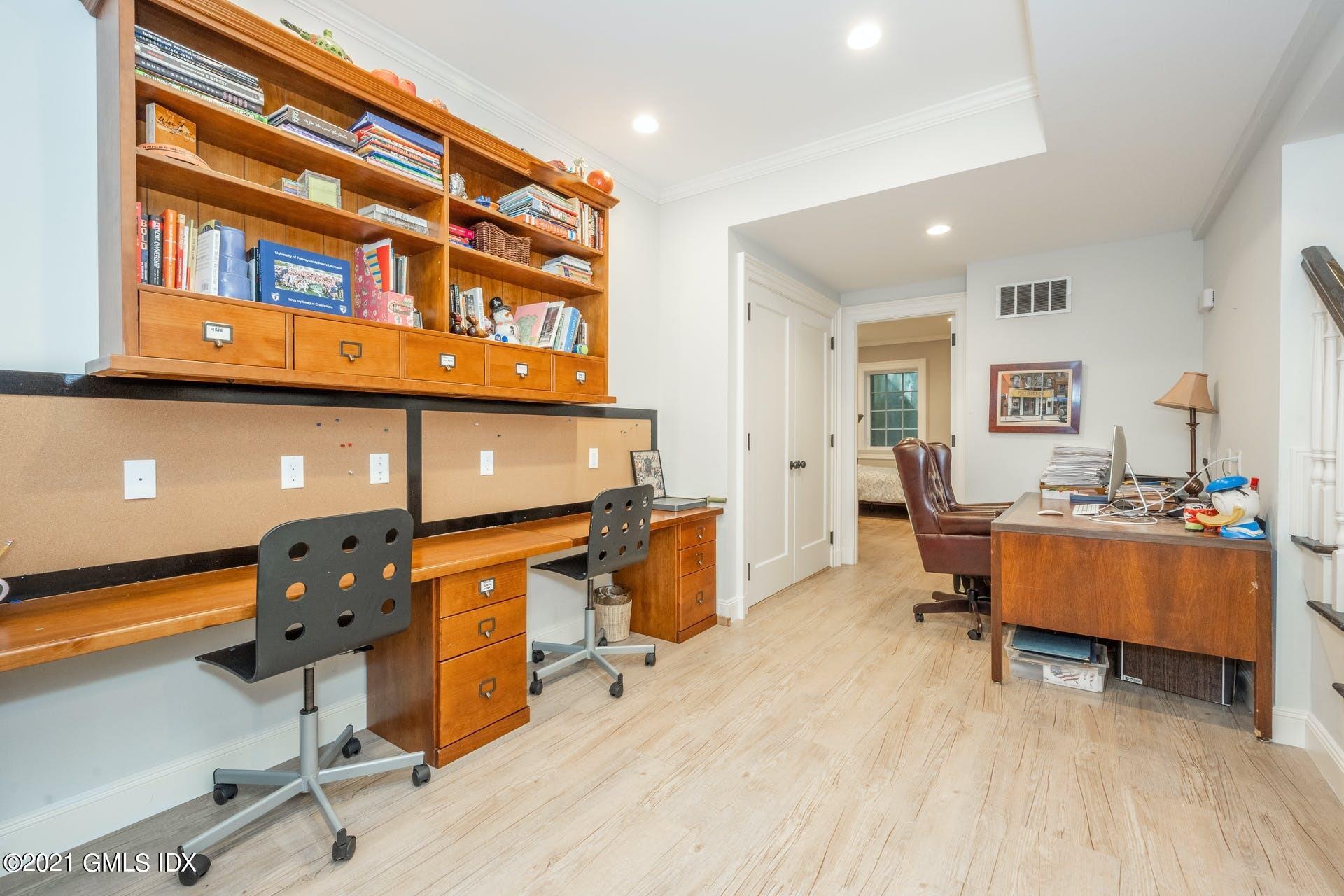 45 Willow Road Riverside, CT 06878 - Photo 33 of 38 a living room with furniture and a gym equipment