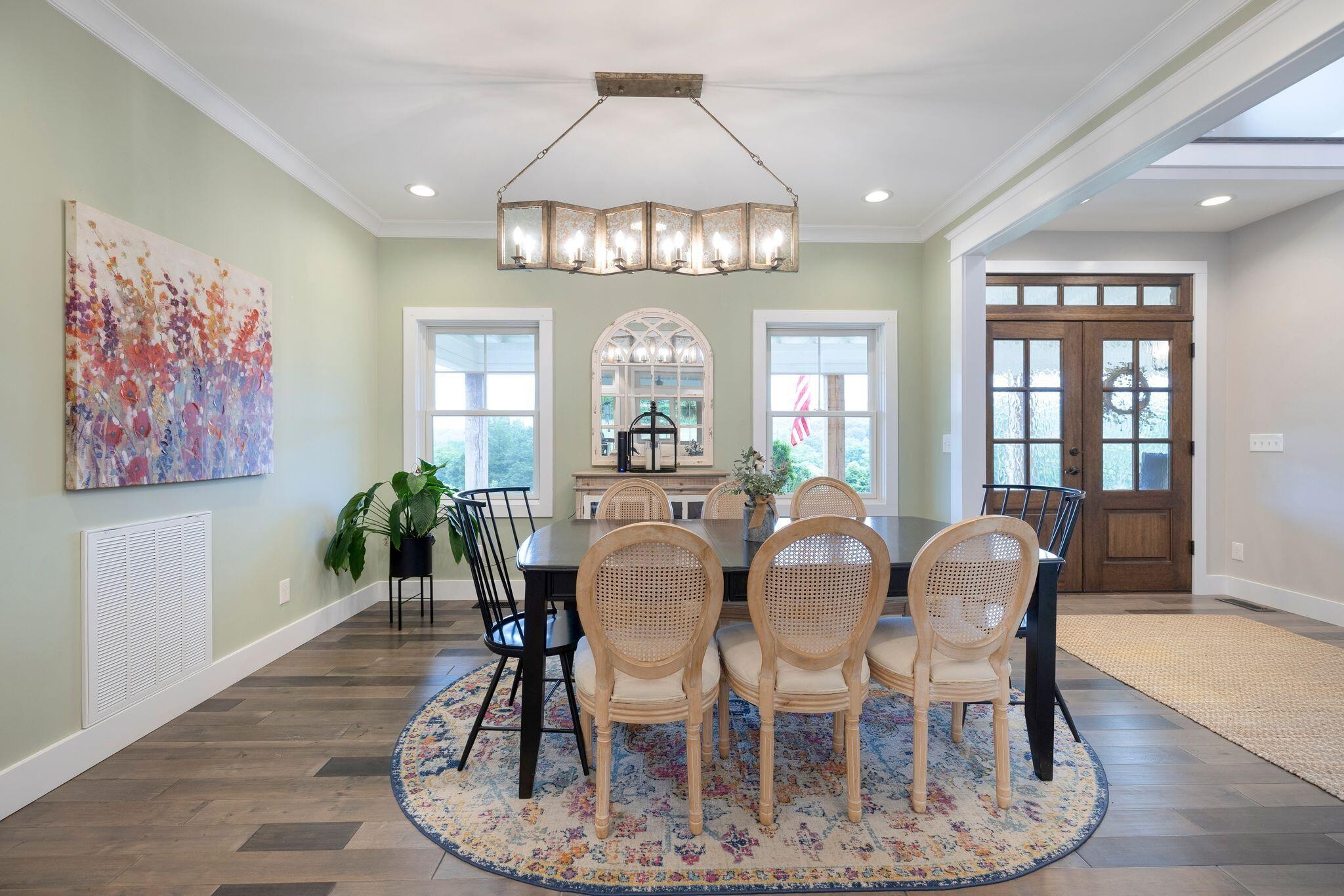 6866 Daus Mountain Road Whitwell, TN 37397 - Photo 11 of 49 a view of a dining room with furniture and chandelier
