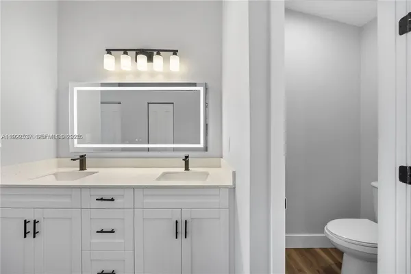 a bathroom with a sink and a toilet