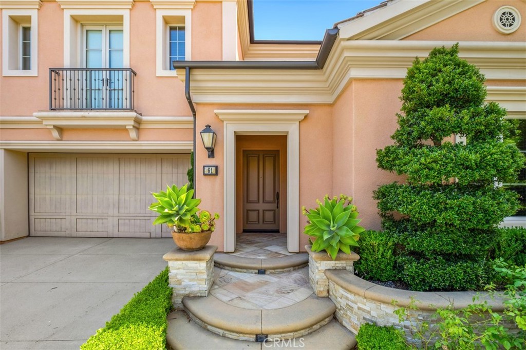 61 Triana Irvine, CA 92618 - Photo 3 of 56 a view of a house with potted plants