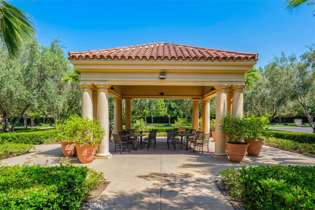 61 Triana Irvine, CA 92618 - Photo 40 of 56 a view of a porch with furniture and garden