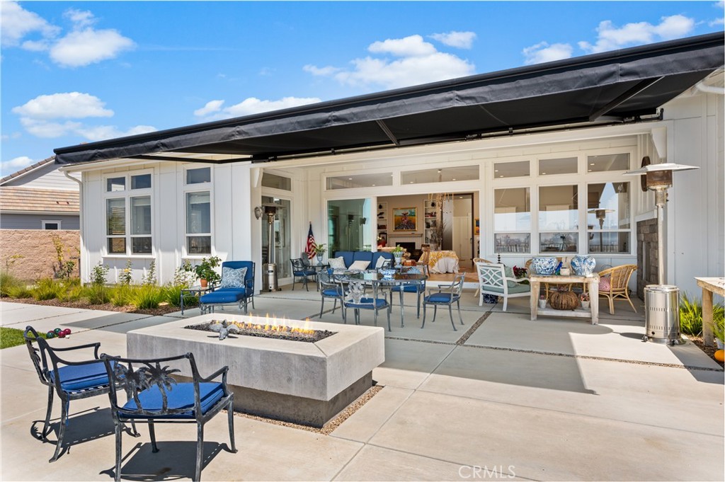 1650 Eucalyptus Road Nipomo, CA 93444 - Photo 10 of 60 a view of a patio with table and chairs and potted plants