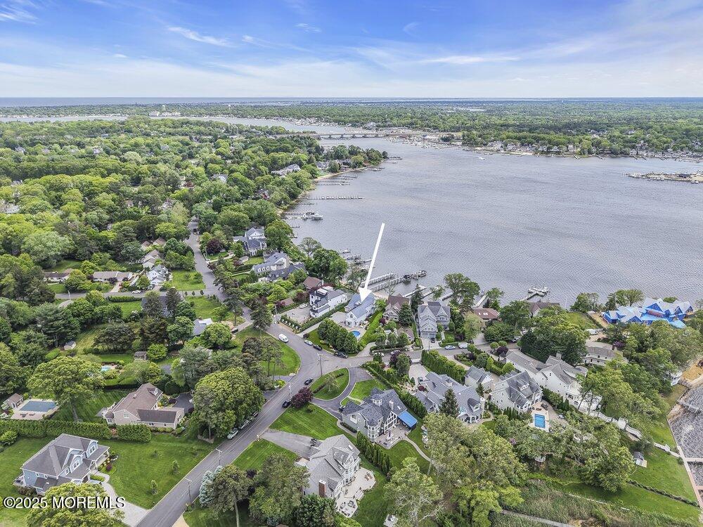 2547 River Road Manasquan, NJ 08736 - Photo 3 of 75 an aerial view of a residential houses with outdoor space and trees