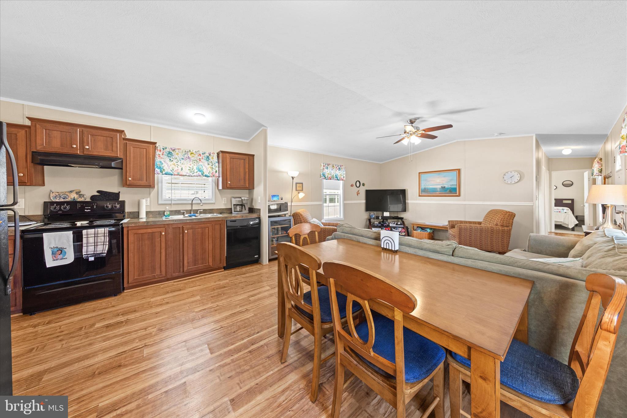 33461 Daisy Street Lewes, DE 19958 - Photo 14 of 42 a large kitchen with a table and chairs