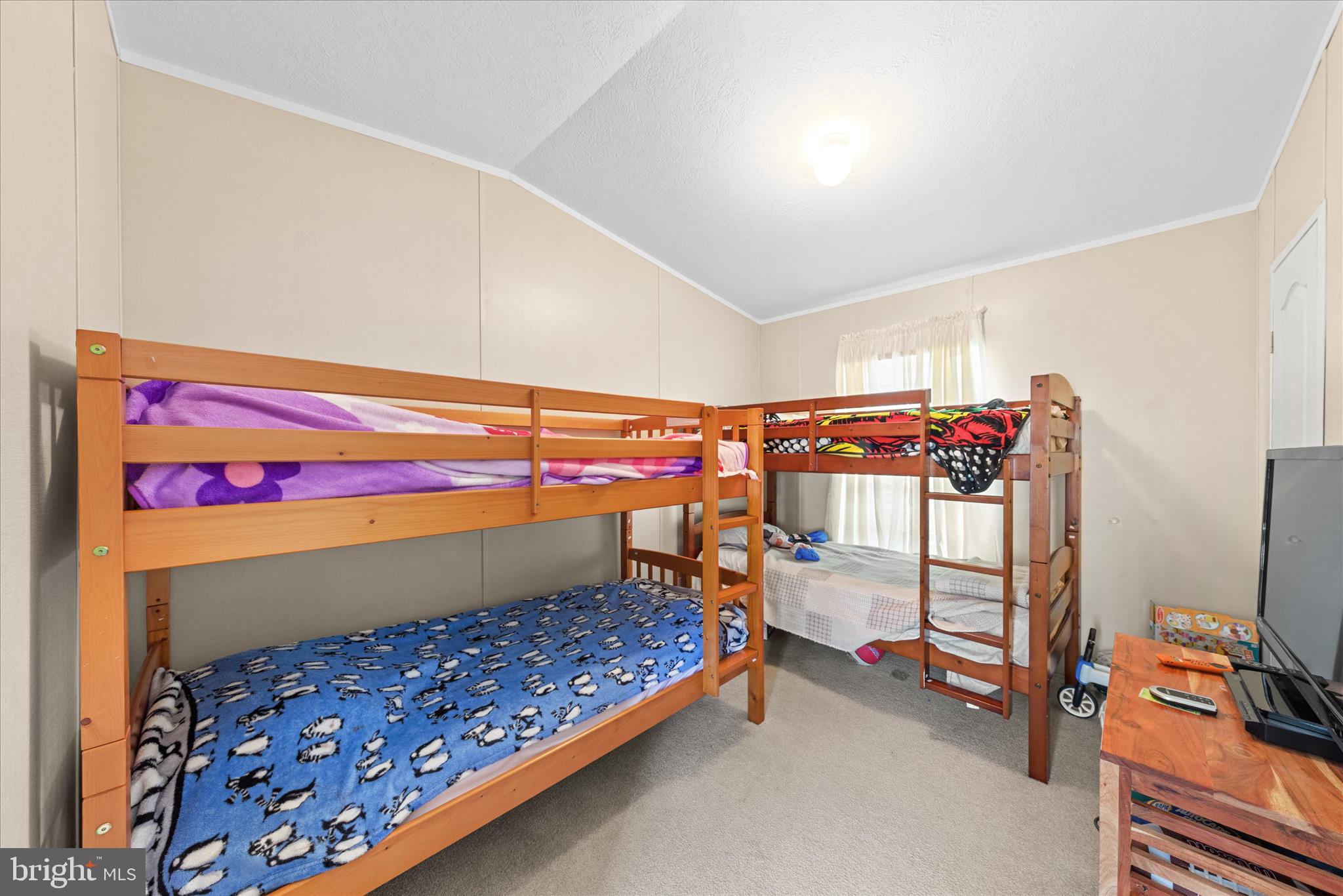 33461 Daisy Street Lewes, DE 19958 - Photo 28 of 42 a bedroom with bunk bed and a desk