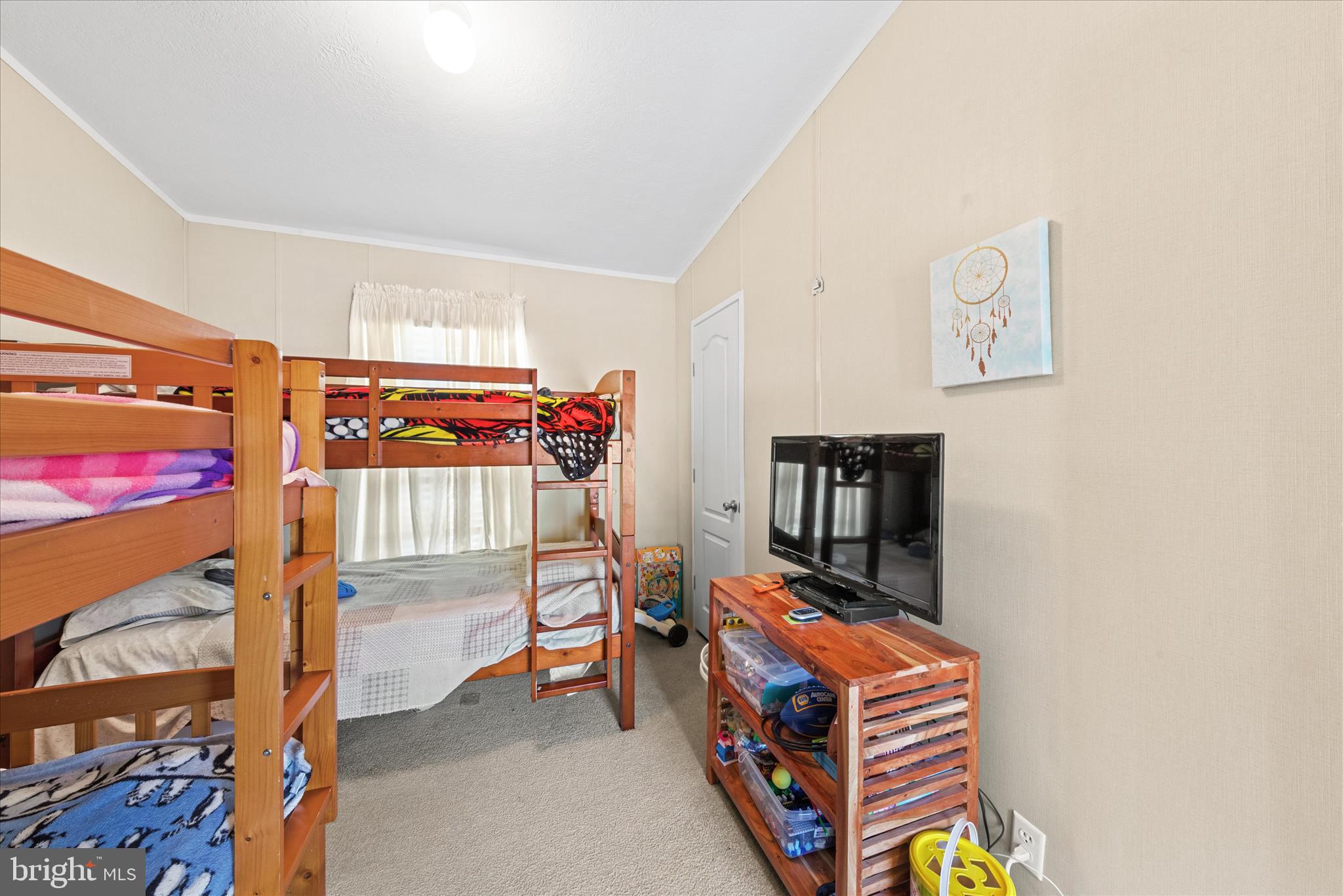 33461 Daisy Street Lewes, DE 19958 - Photo 29 of 42 a room with furniture and closet