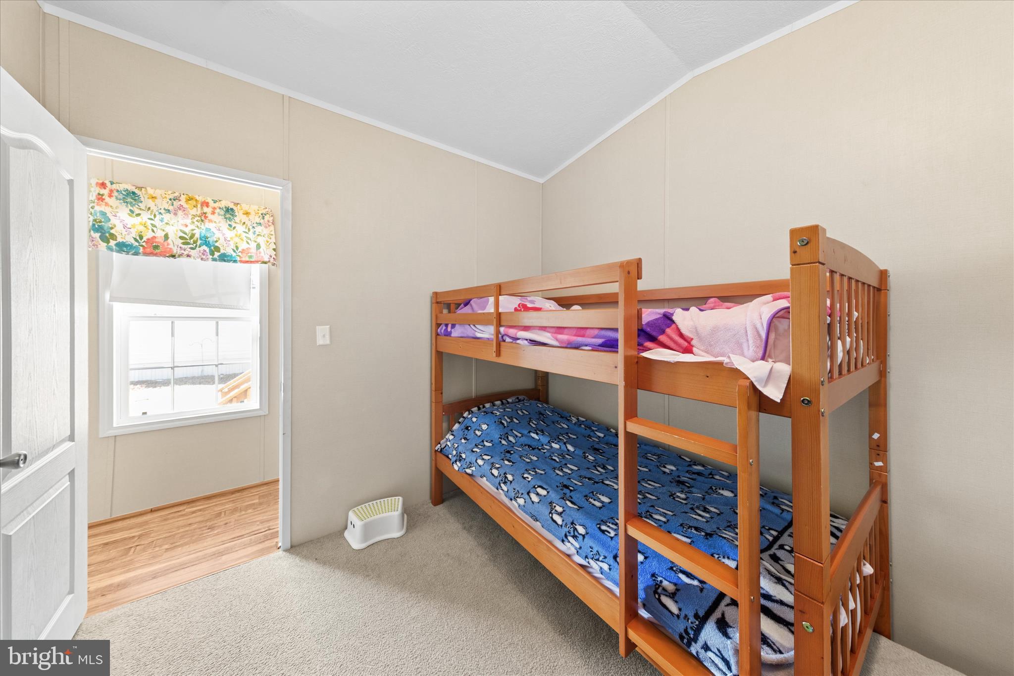 33461 Daisy Street Lewes, DE 19958 - Photo 31 of 42 a bedroom with a bed and a window