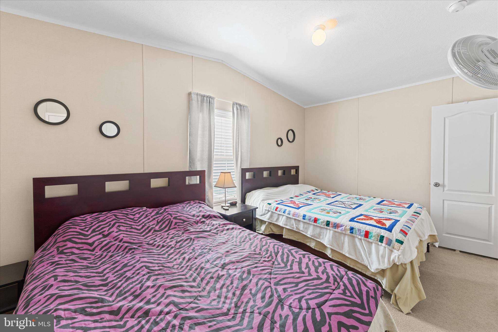 33461 Daisy Street Lewes, DE 19958 - Photo 35 of 42 a bedroom with a bed and a window