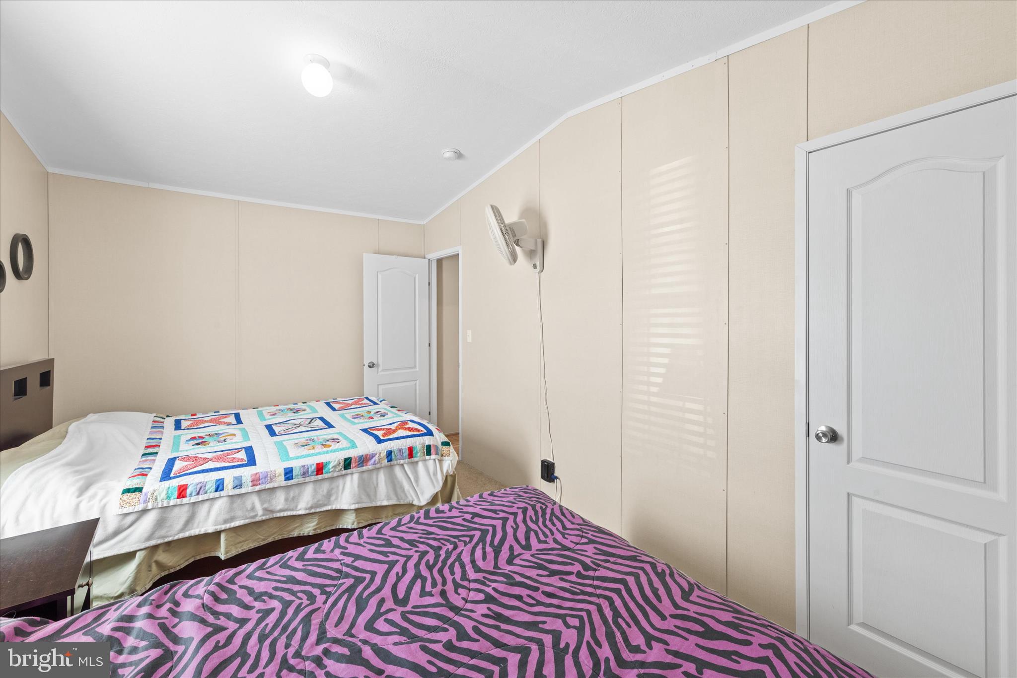 33461 Daisy Street Lewes, DE 19958 - Photo 36 of 42 a bedroom with a bed and a closet