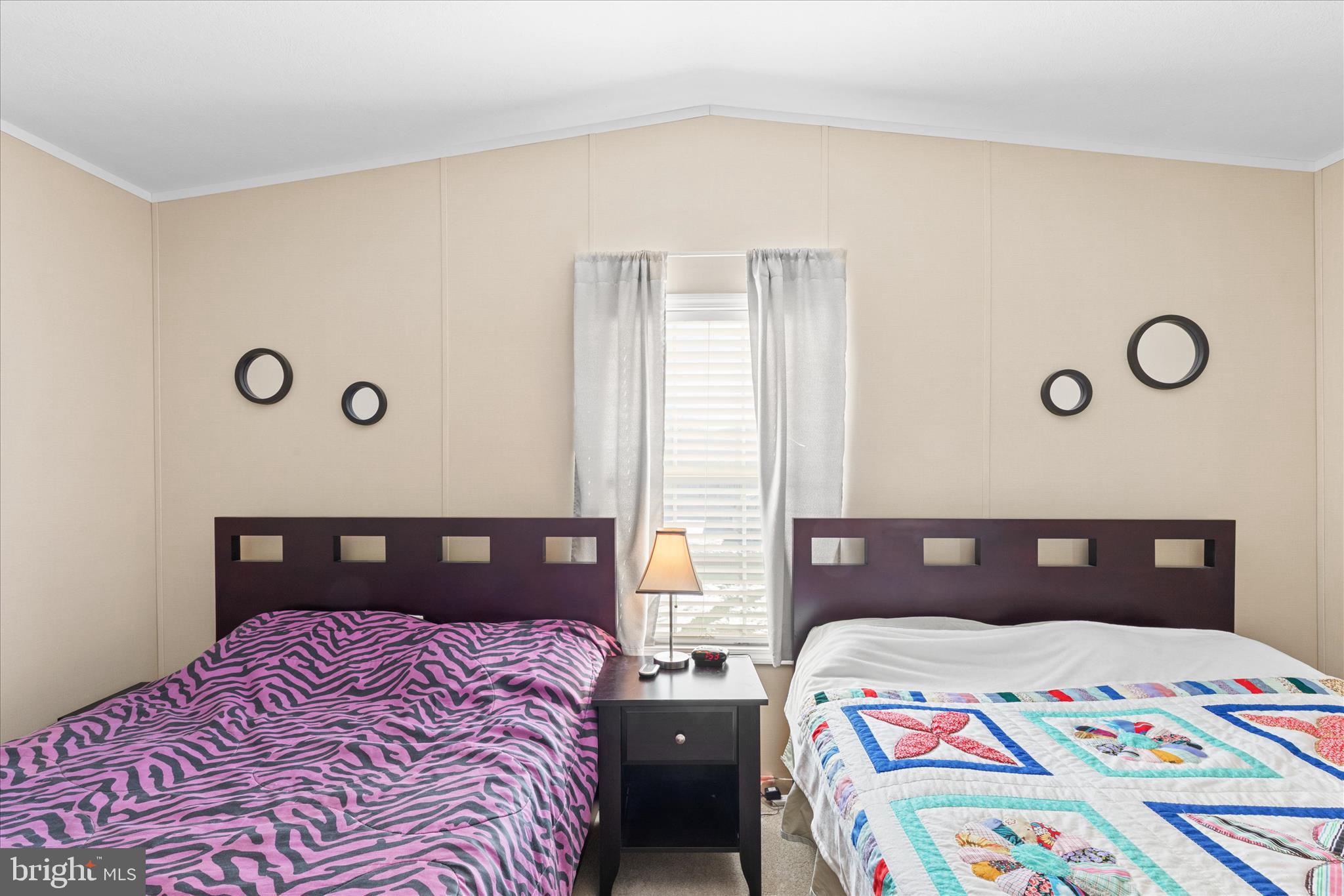 33461 Daisy Street Lewes, DE 19958 - Photo 38 of 42 a bedroom with two beds and a lamp