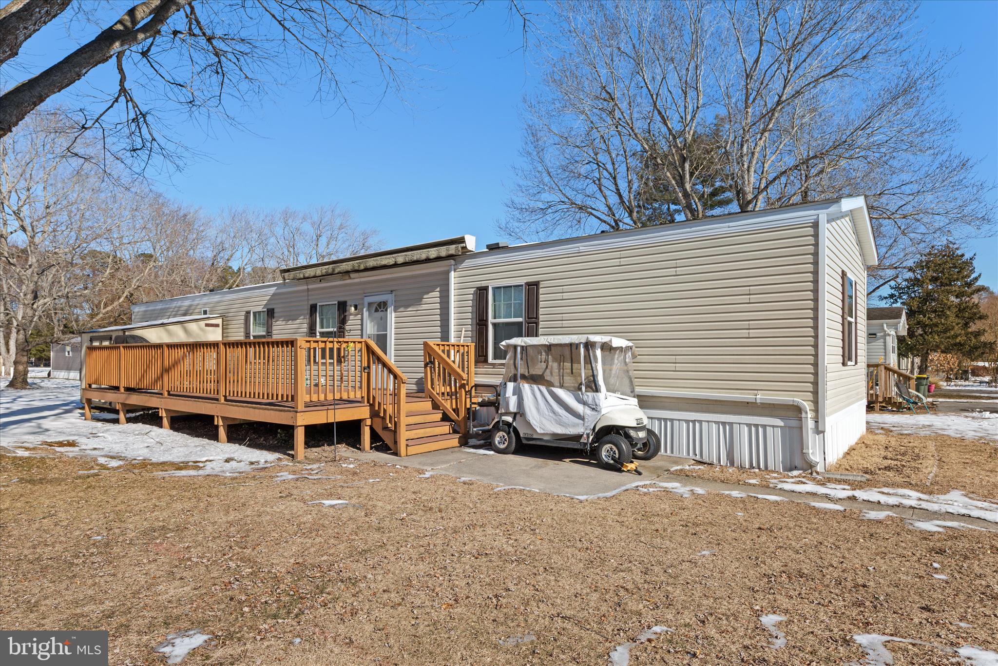 33461 Daisy Street Lewes, DE 19958 - Photo 4 of 42 a car parked in front of a house