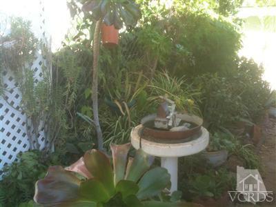 1225 South Rice Road, Unit 57 Ojai, CA 93023 - Photo 5 of 7 a view of a fountain in the outside of the house