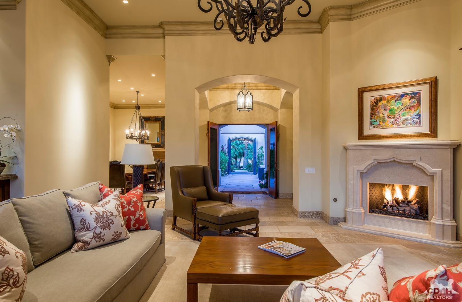 80515 Weiskopf La Quinta, CA 92253 - Photo 20 of 46 a living room with furniture and a fireplace