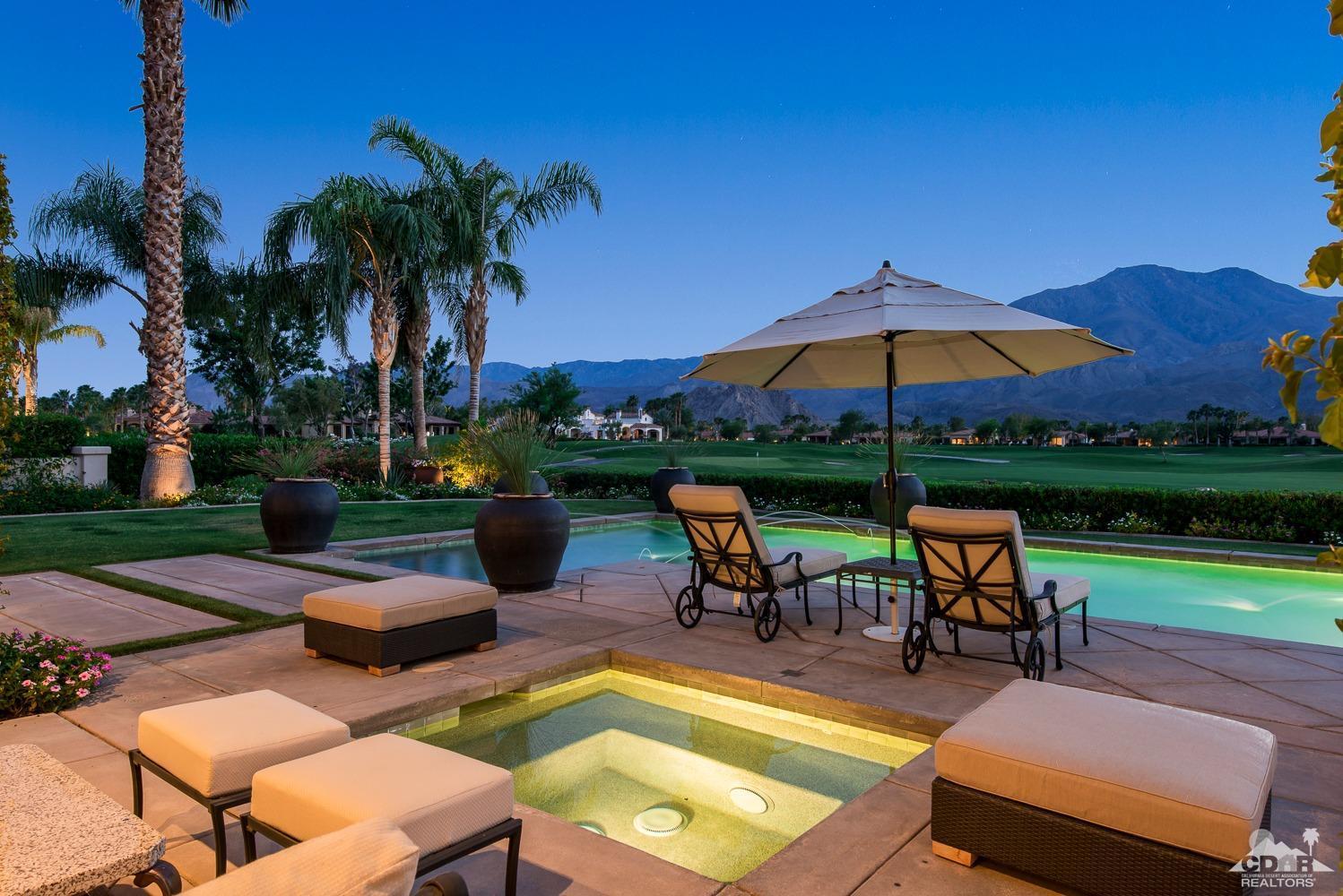 80515 Weiskopf La Quinta, CA 92253 - Photo 2 of 46 a view of a backyard with swimming pool and sitting area