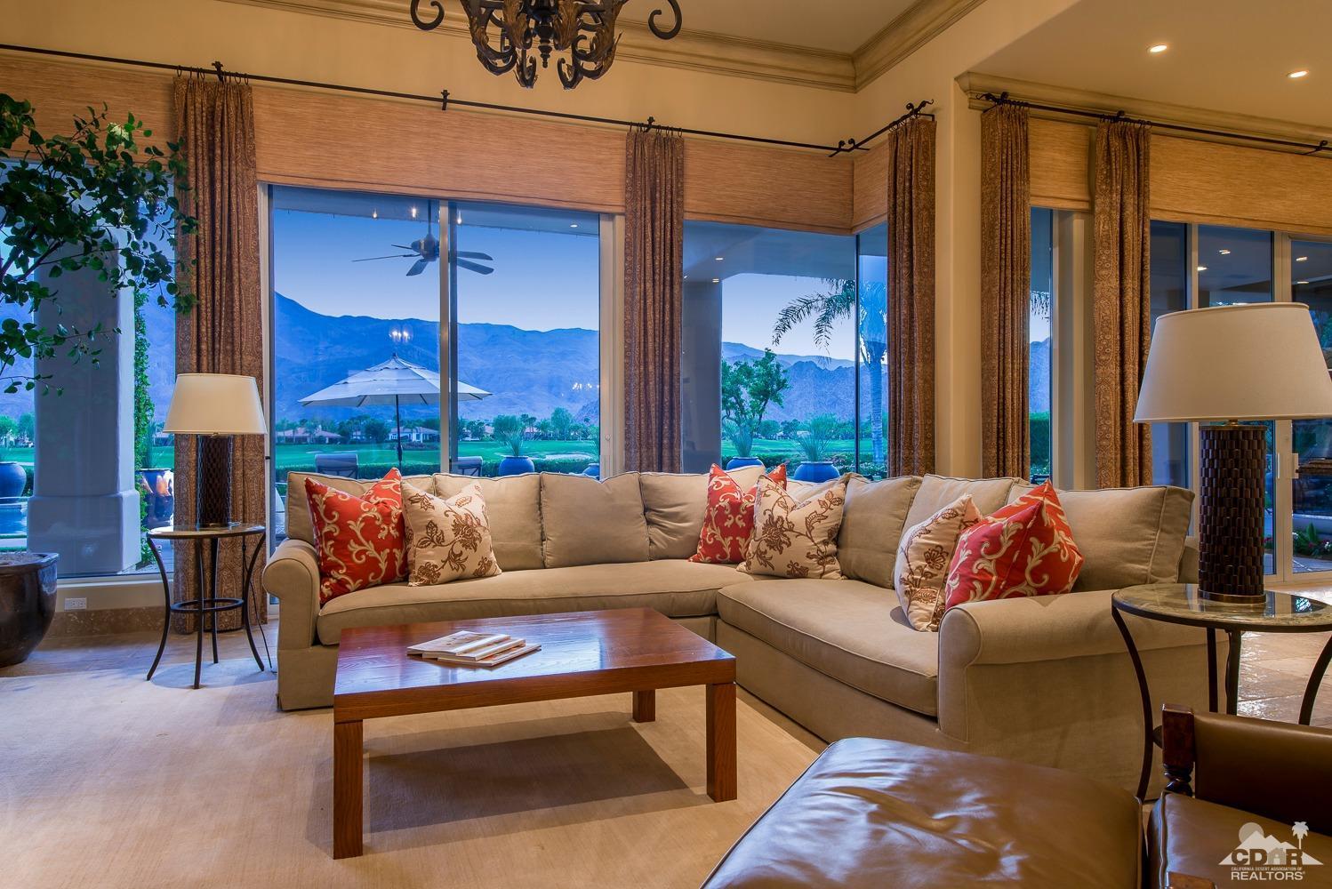 80515 Weiskopf La Quinta, CA 92253 - Photo 21 of 46 a living room with furniture and a lamp