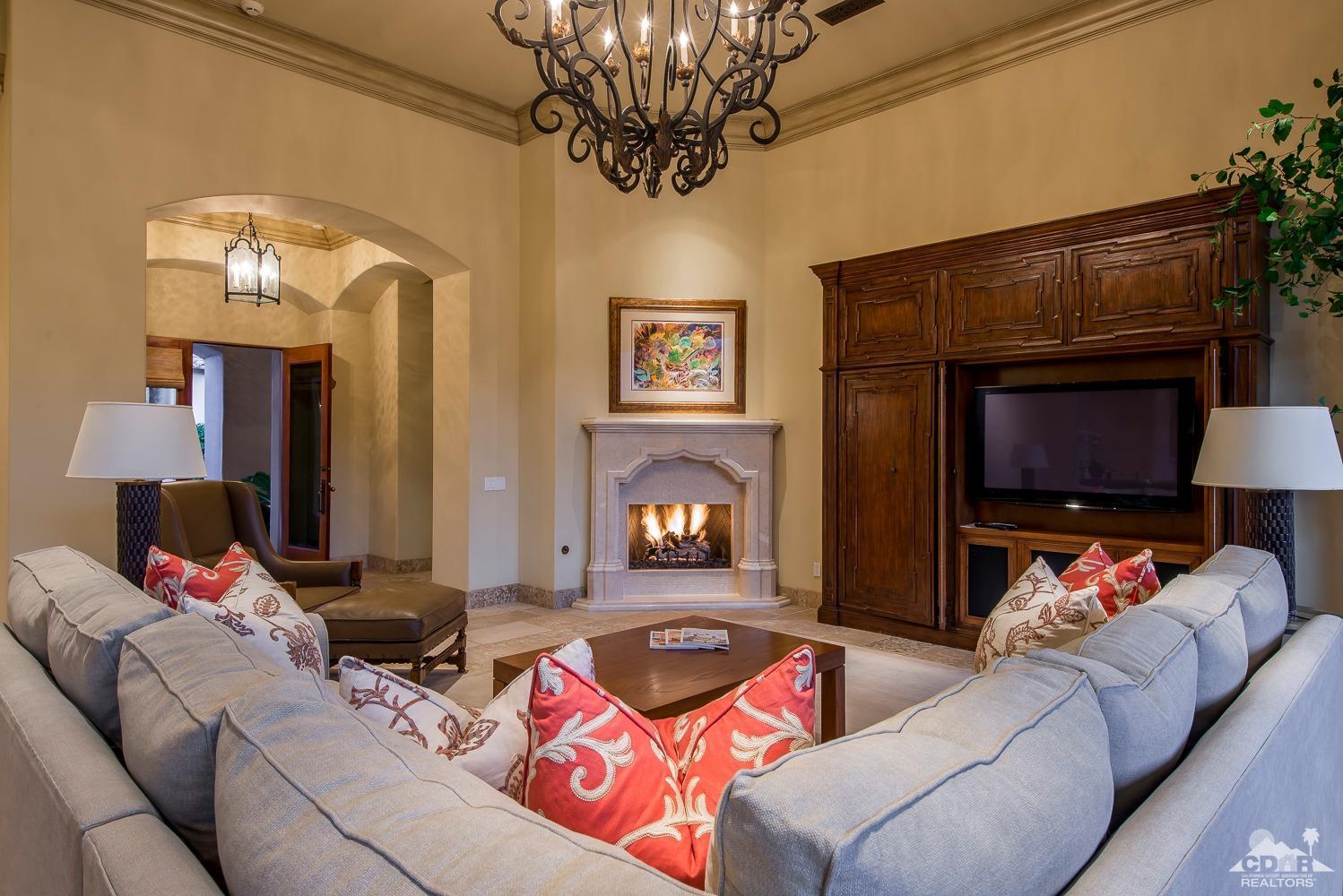 80515 Weiskopf La Quinta, CA 92253 - Photo 22 of 46 a living room with furniture and a fireplace