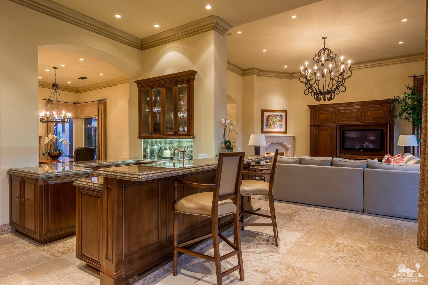 80515 Weiskopf La Quinta, CA 92253 - Photo 25 of 46 a view of a dining room with furniture and a chandelier