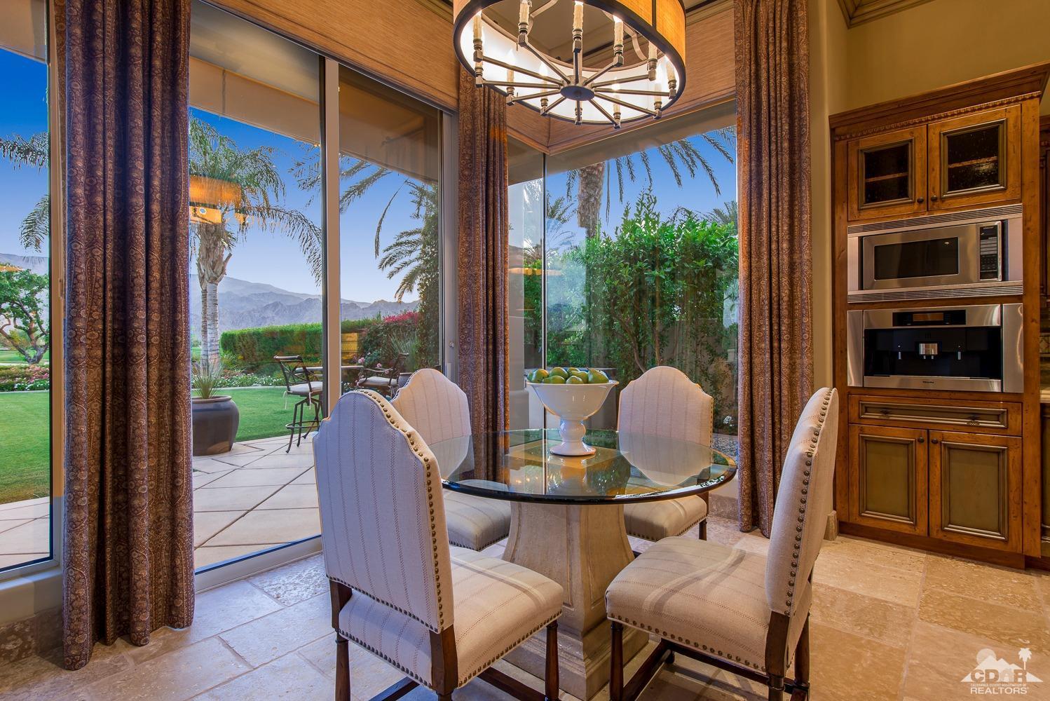 80515 Weiskopf La Quinta, CA 92253 - Photo 35 of 46 a dining room with furniture and garden view