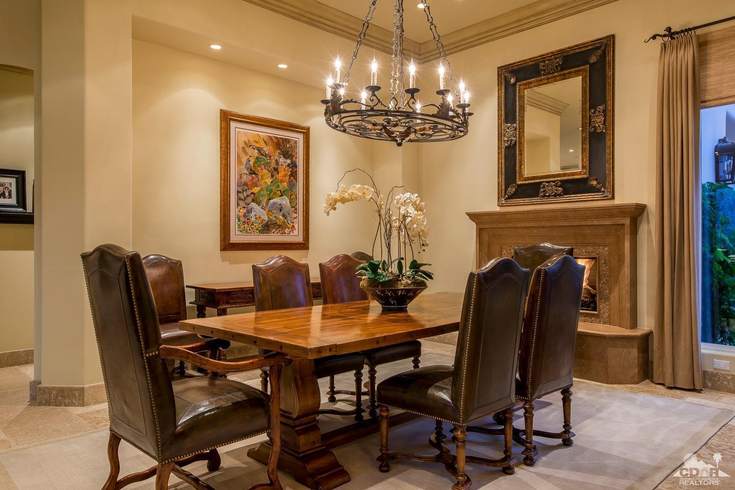 80515 Weiskopf La Quinta, CA 92253 - Photo 36 of 46 a view of a dining room with furniture and a chandelier