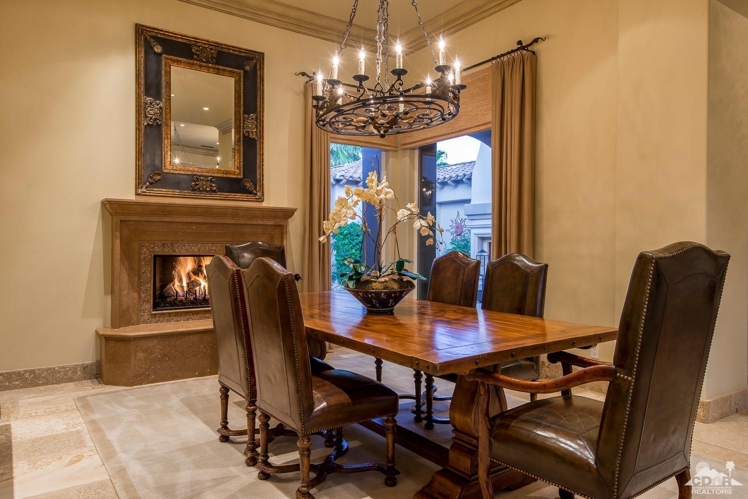 80515 Weiskopf La Quinta, CA 92253 - Photo 37 of 46 a view of a dining room with furniture and chandelier