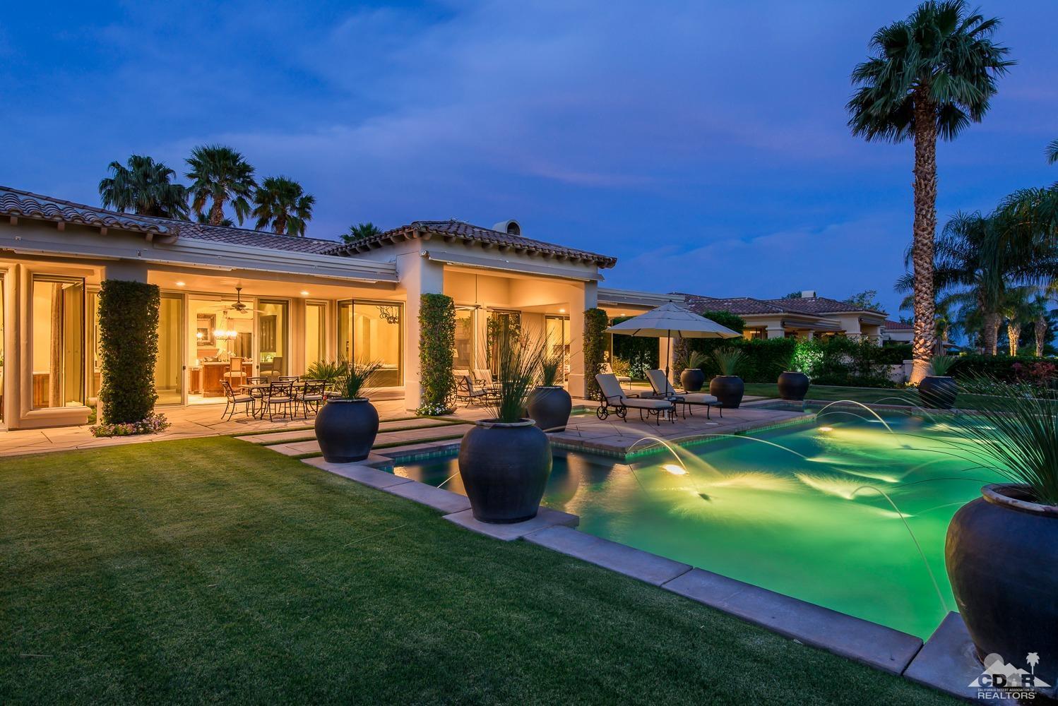 80515 Weiskopf La Quinta, CA 92253 - Photo 4 of 46 a view of a swimming pool with an outdoor seating
