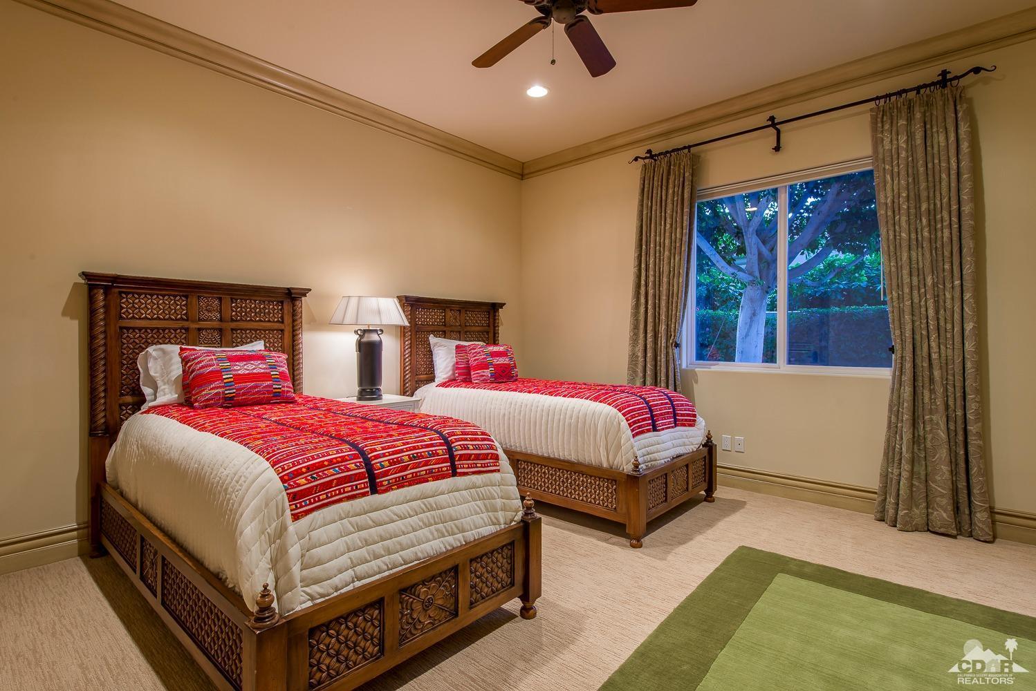 80515 Weiskopf La Quinta, CA 92253 - Photo 46 of 46 a bedroom with a bed and window