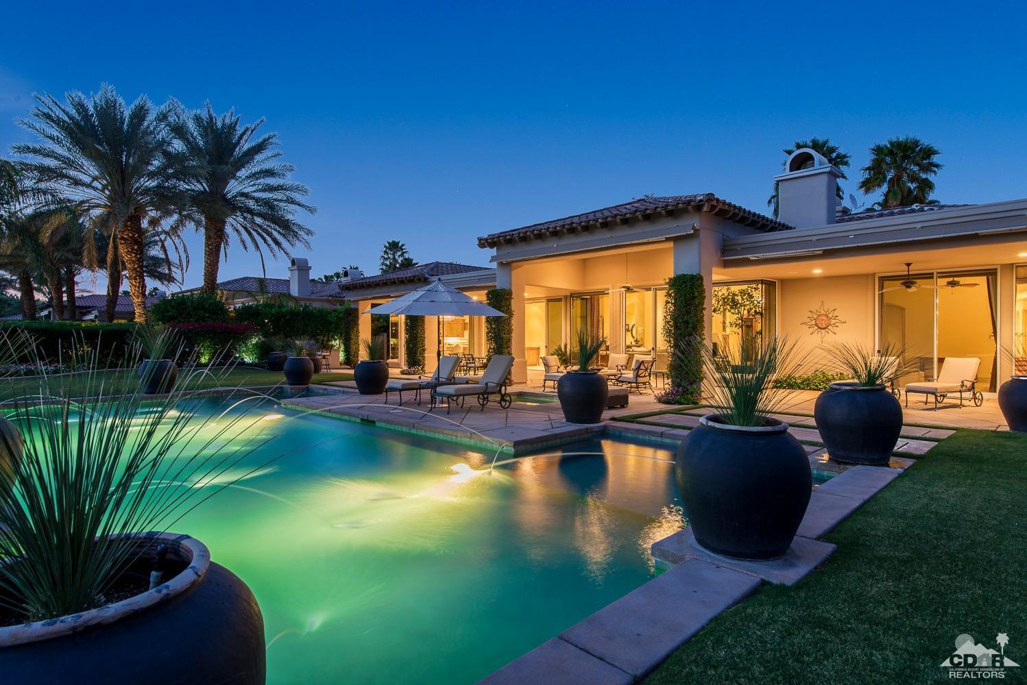 80515 Weiskopf La Quinta, CA 92253 - Photo 6 of 46 a view of swimming pool with outdoor seating and a garden